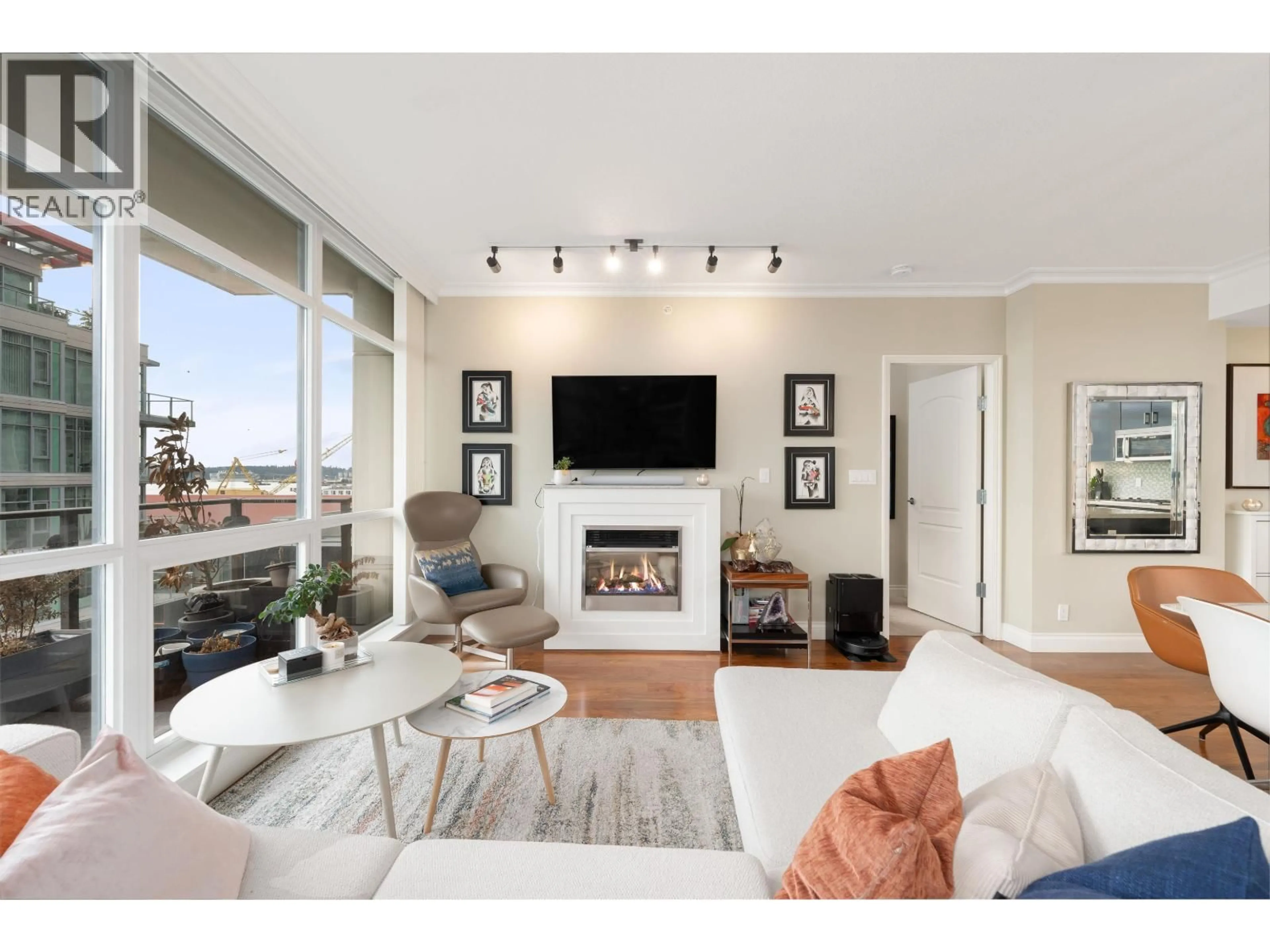 Living room with furniture, unknown for 804 - 162 VICTORY SHIP WAY, North Vancouver British Columbia V7L0B4