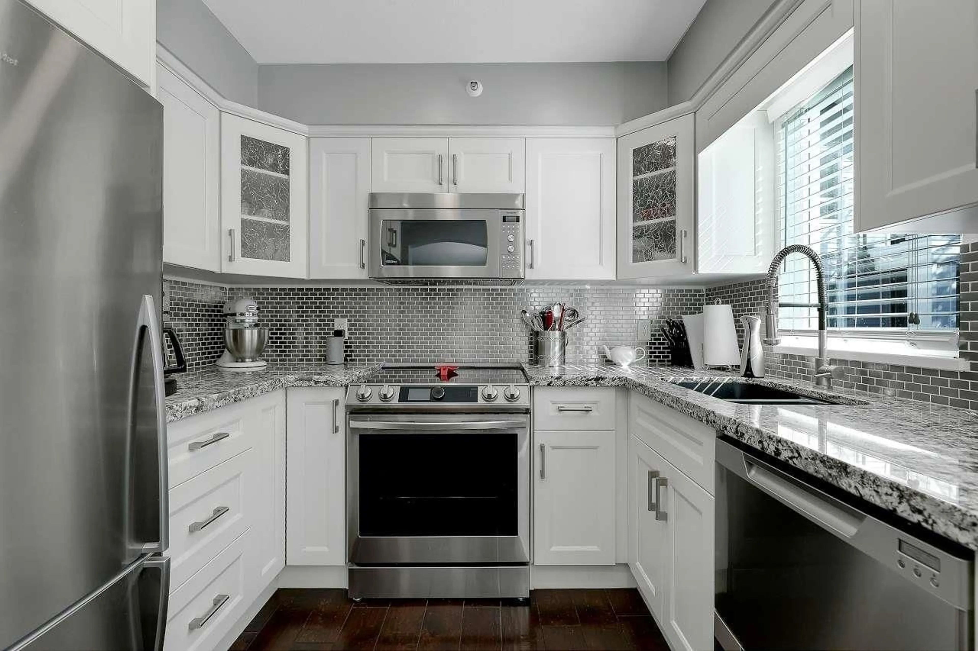Contemporary kitchen, ceramic/tile floor for 211 - 20976 56, Langley British Columbia V3A7Z2