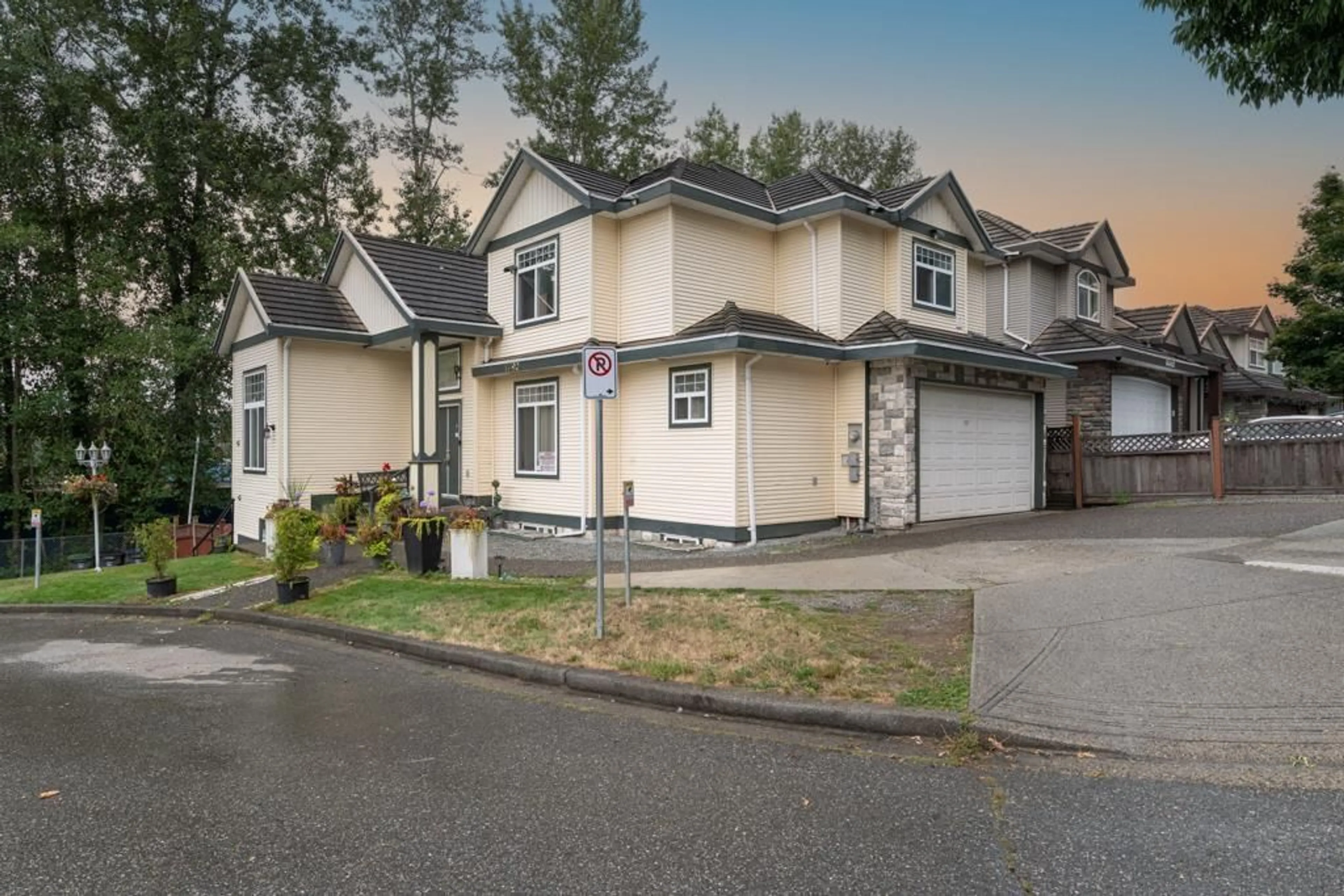 Home with vinyl exterior material, street for 14490 67B, Surrey British Columbia V3S0T3