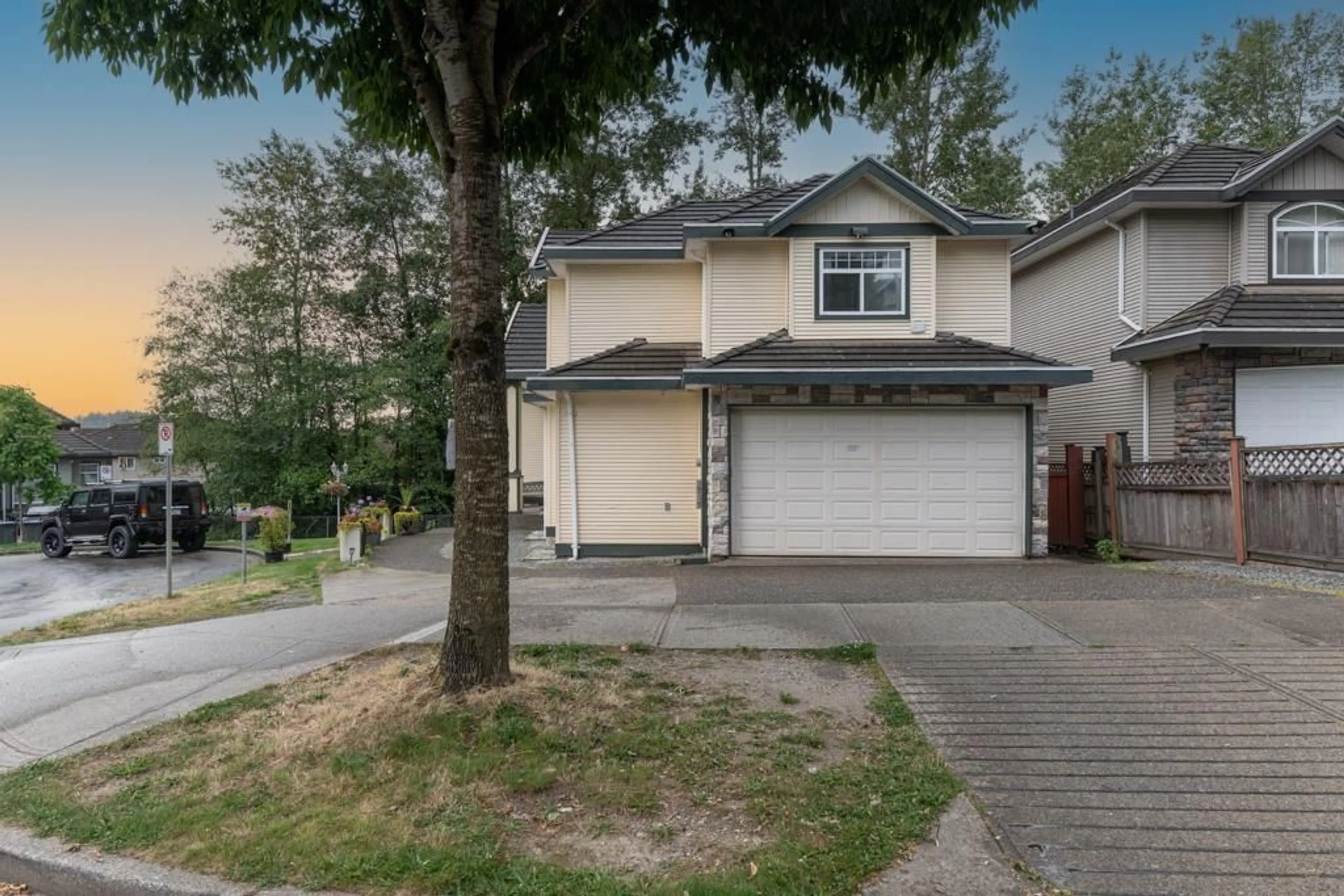 Home with vinyl exterior material, street for 14490 67B, Surrey British Columbia V3S0T3