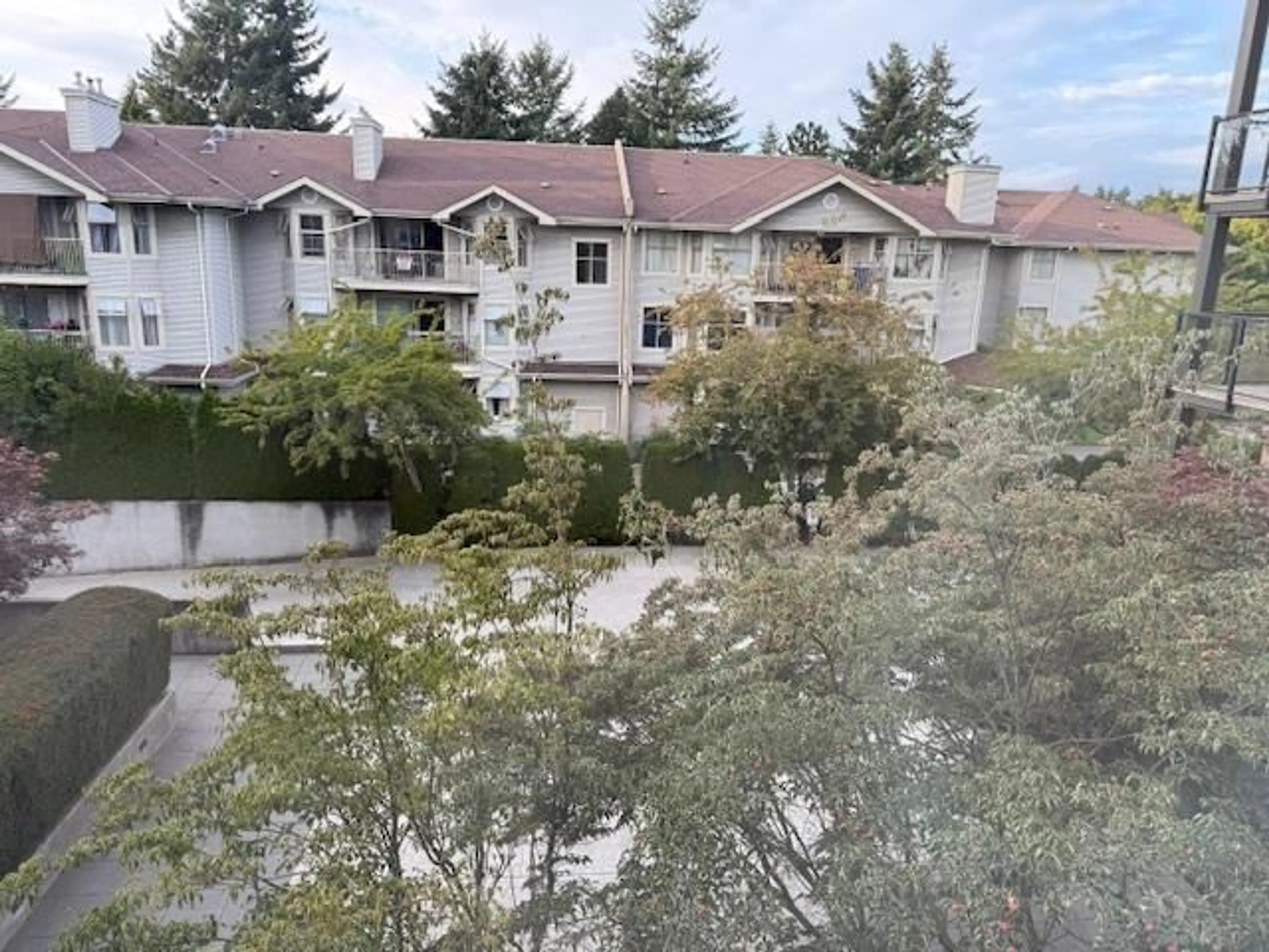 A pic from outside/outdoor area/front of a property/back of a property/a pic from drone, unknown for 301 - 10707 139, Surrey British Columbia V3T0B2