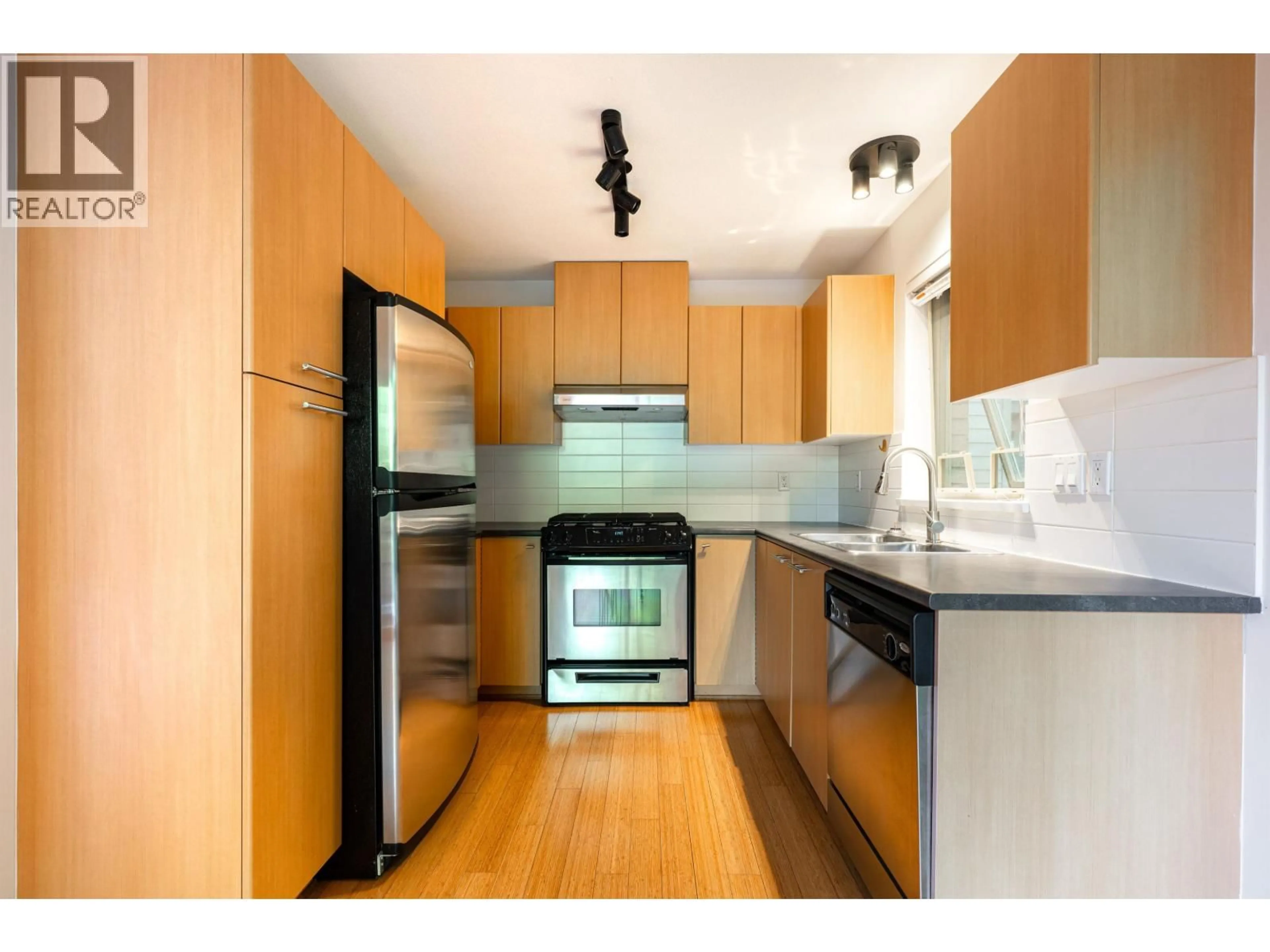 Standard kitchen, wood/laminate floor for 203 - 9329 UNIVERSITY CRESCENT, Burnaby British Columbia V5A4Y4