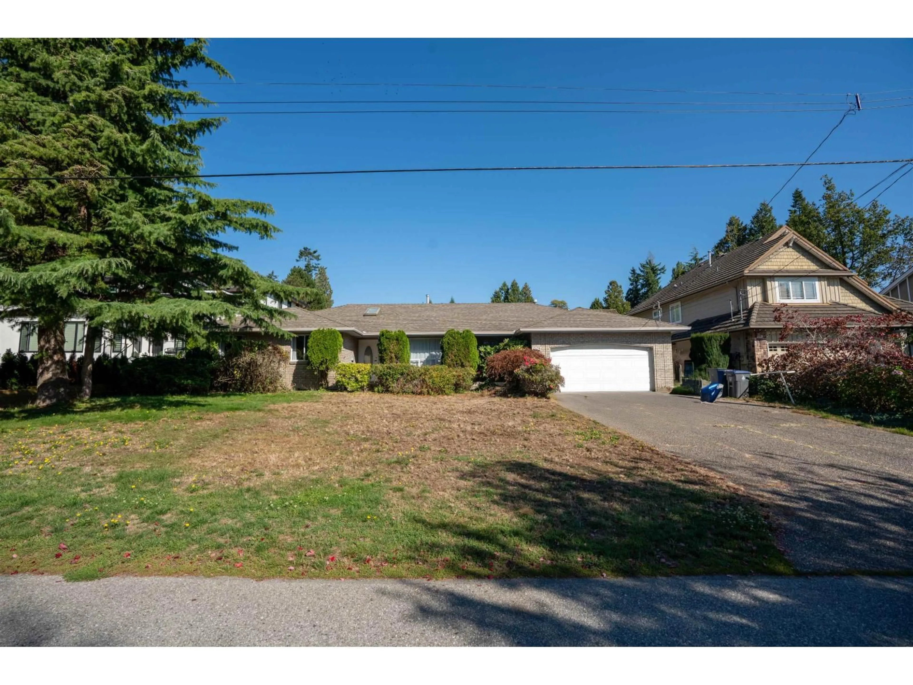 A pic from outside/outdoor area/front of a property/back of a property/a pic from drone, street for 13139 14, Surrey British Columbia V4A1G6