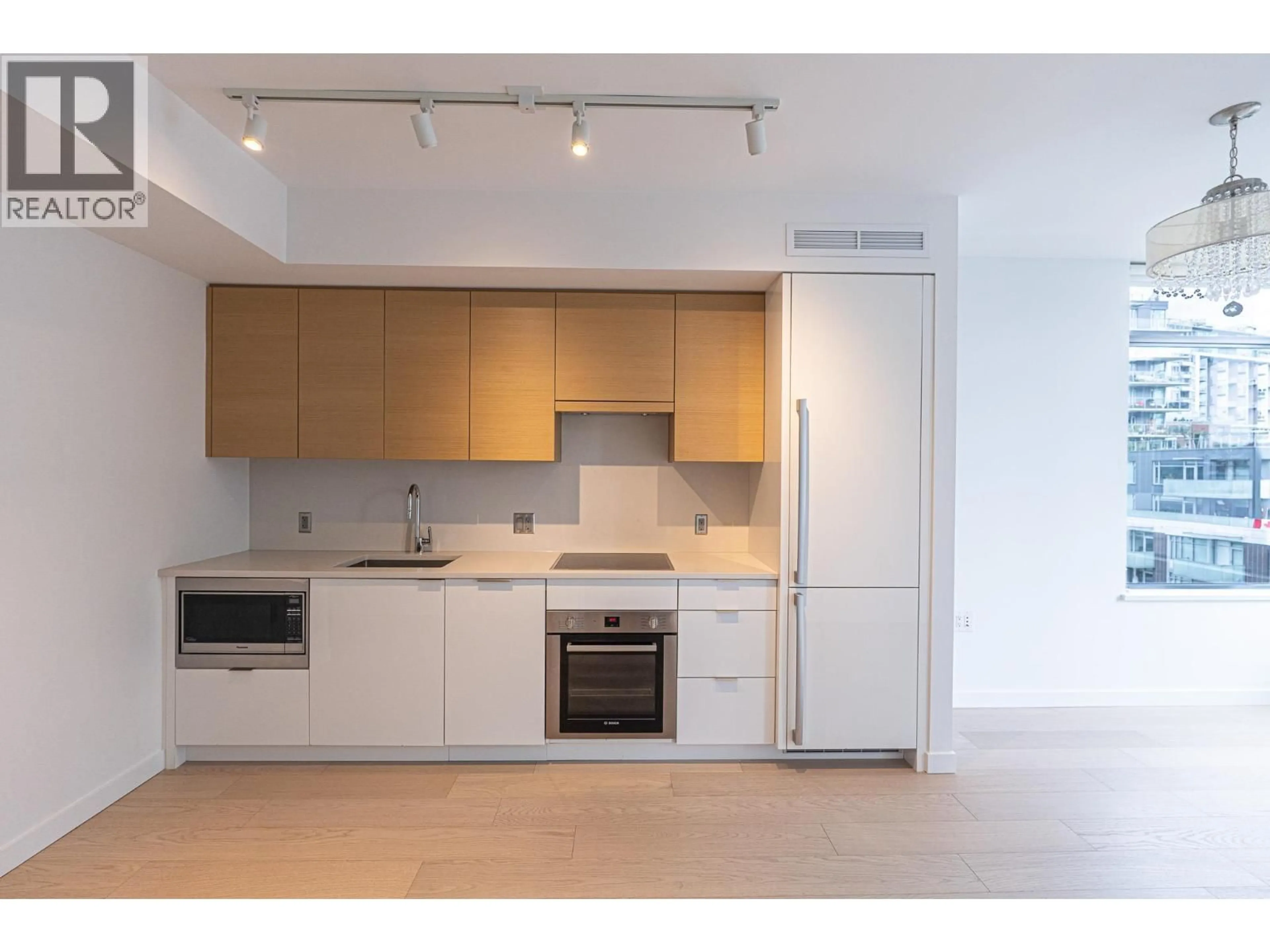 Standard kitchen, wood/laminate floor for 701 - 1688 PULLMAN PORTER STREET, Vancouver British Columbia V6A0H3