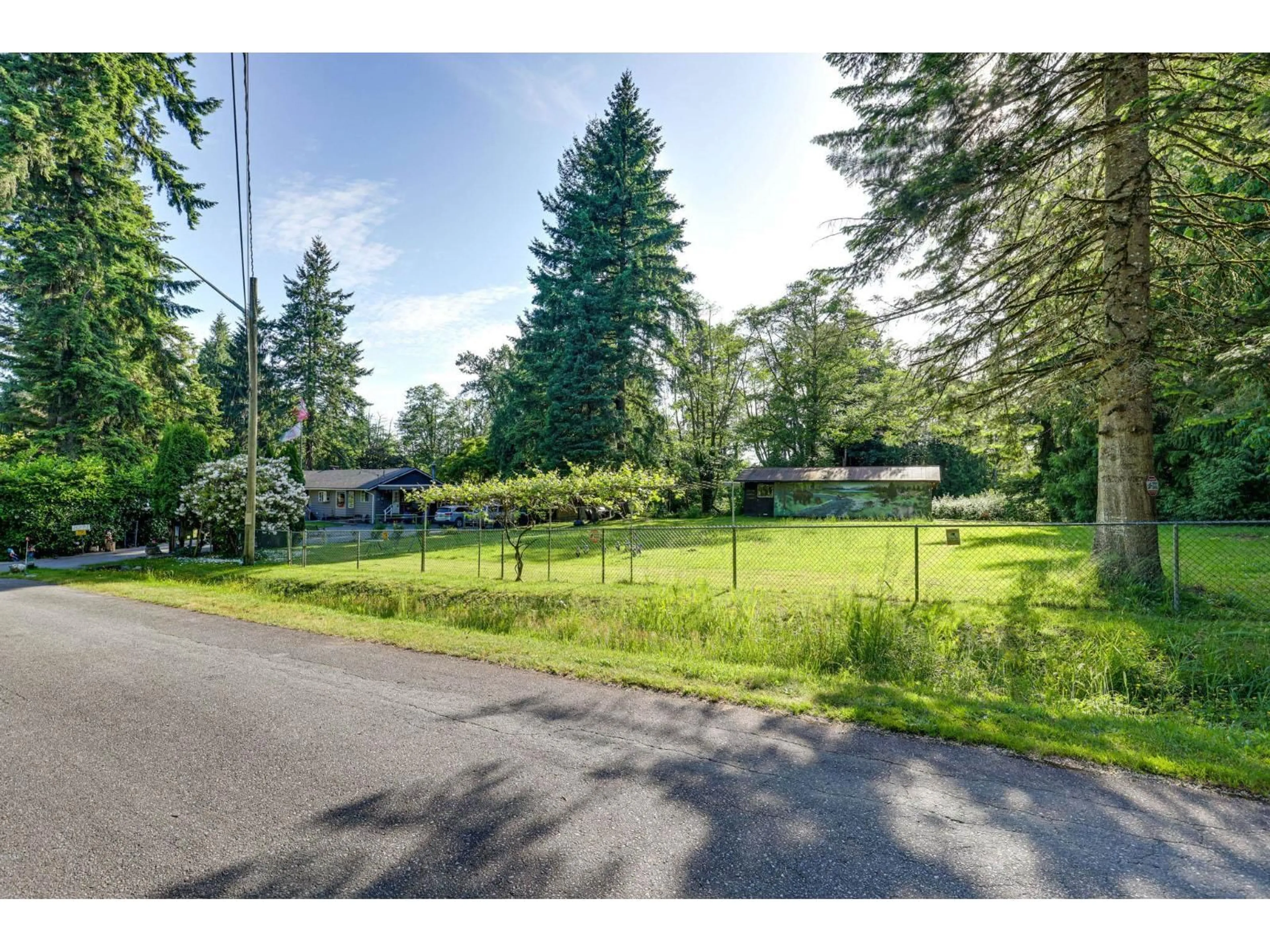 A pic from outside/outdoor area/front of a property/back of a property/a pic from drone, unknown for 8281 148, Surrey British Columbia V3S3G2