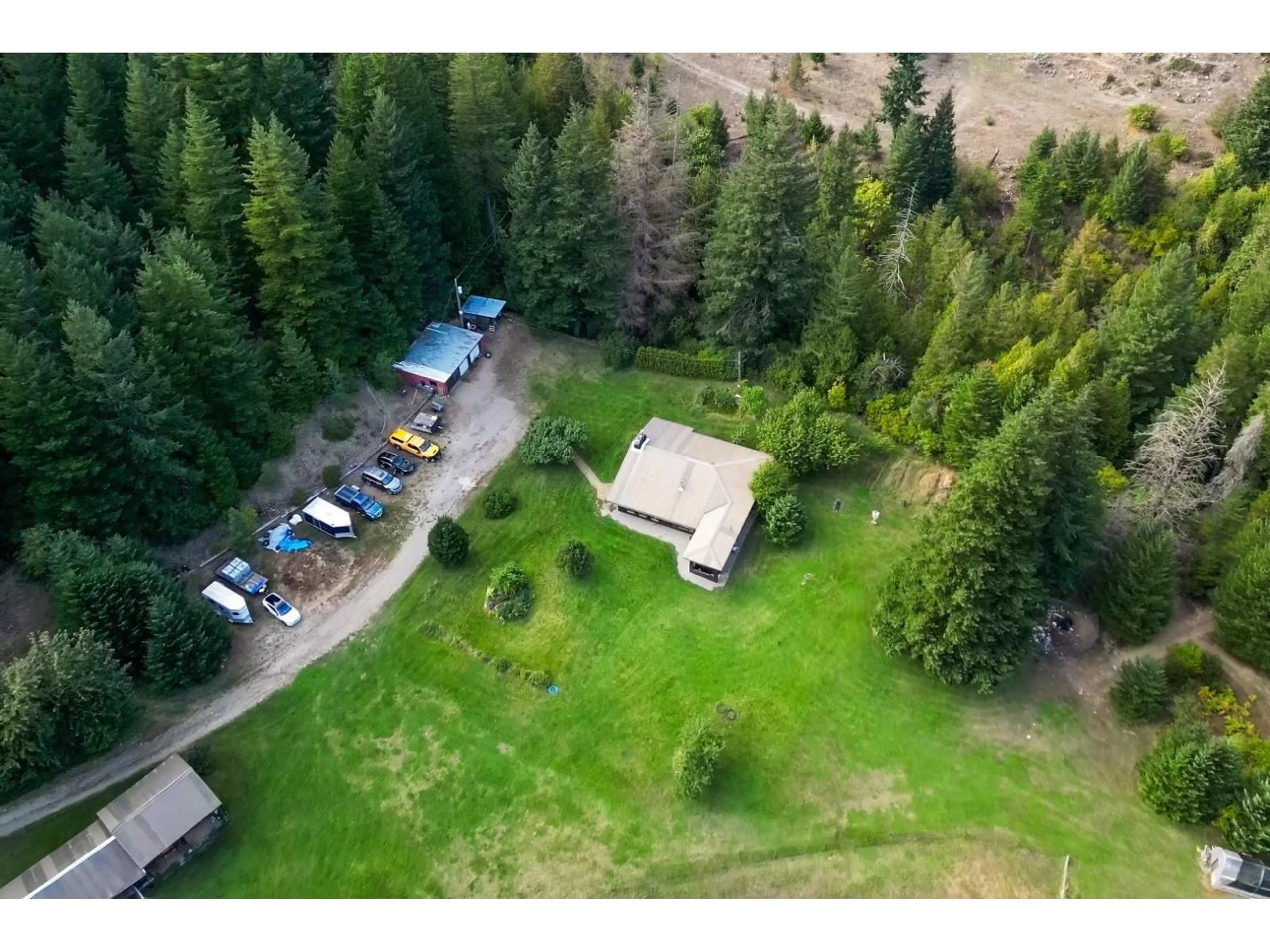 A pic from outside/outdoor area/front of a property/back of a property/a pic from drone, forest/trees view for 50900 CHAUMOX ROAD, Boston Bar / Lytton British Columbia V0X1C1