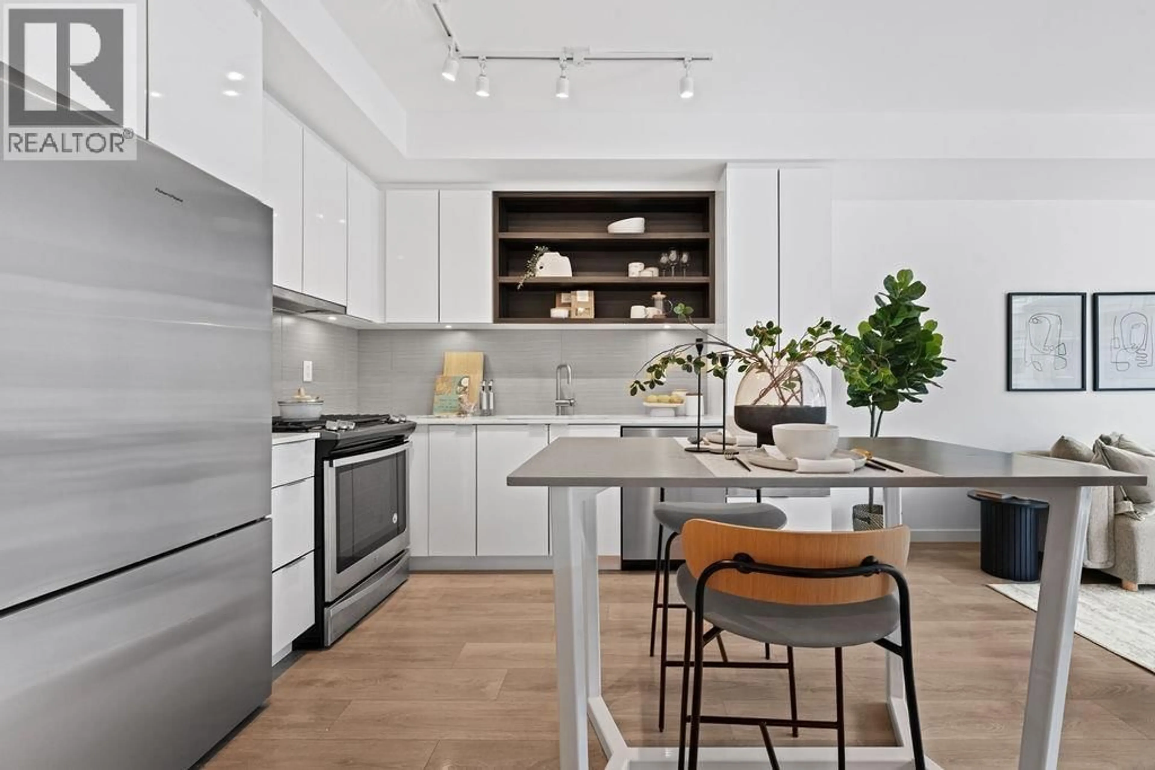 Contemporary kitchen, ceramic/tile floor for 206 - 725 MARINE DRIVE, North Vancouver British Columbia V7M0G2