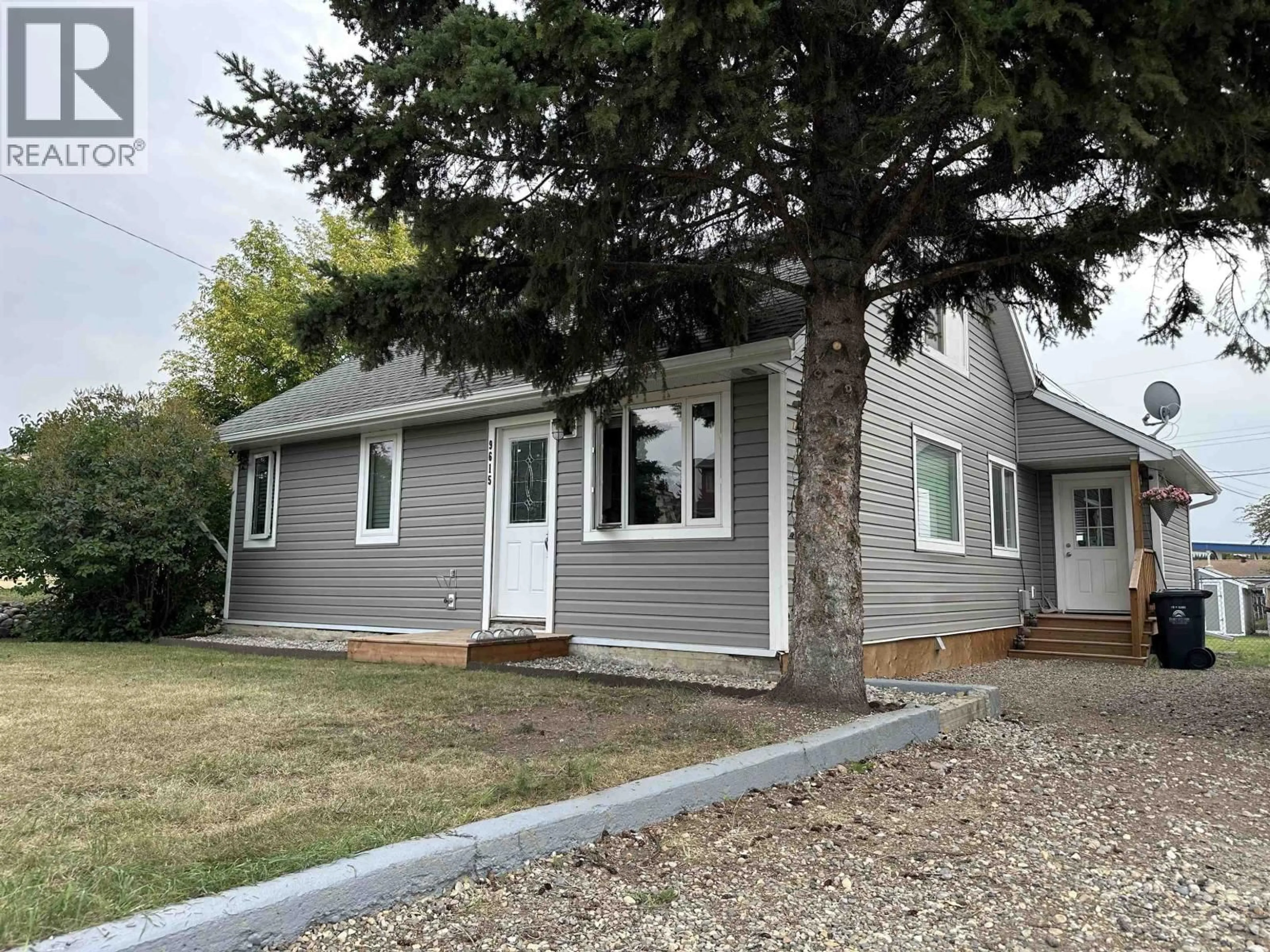 Home with vinyl exterior material, street for 9615 97 AVENUE, Fort St. John British Columbia V1J1N2