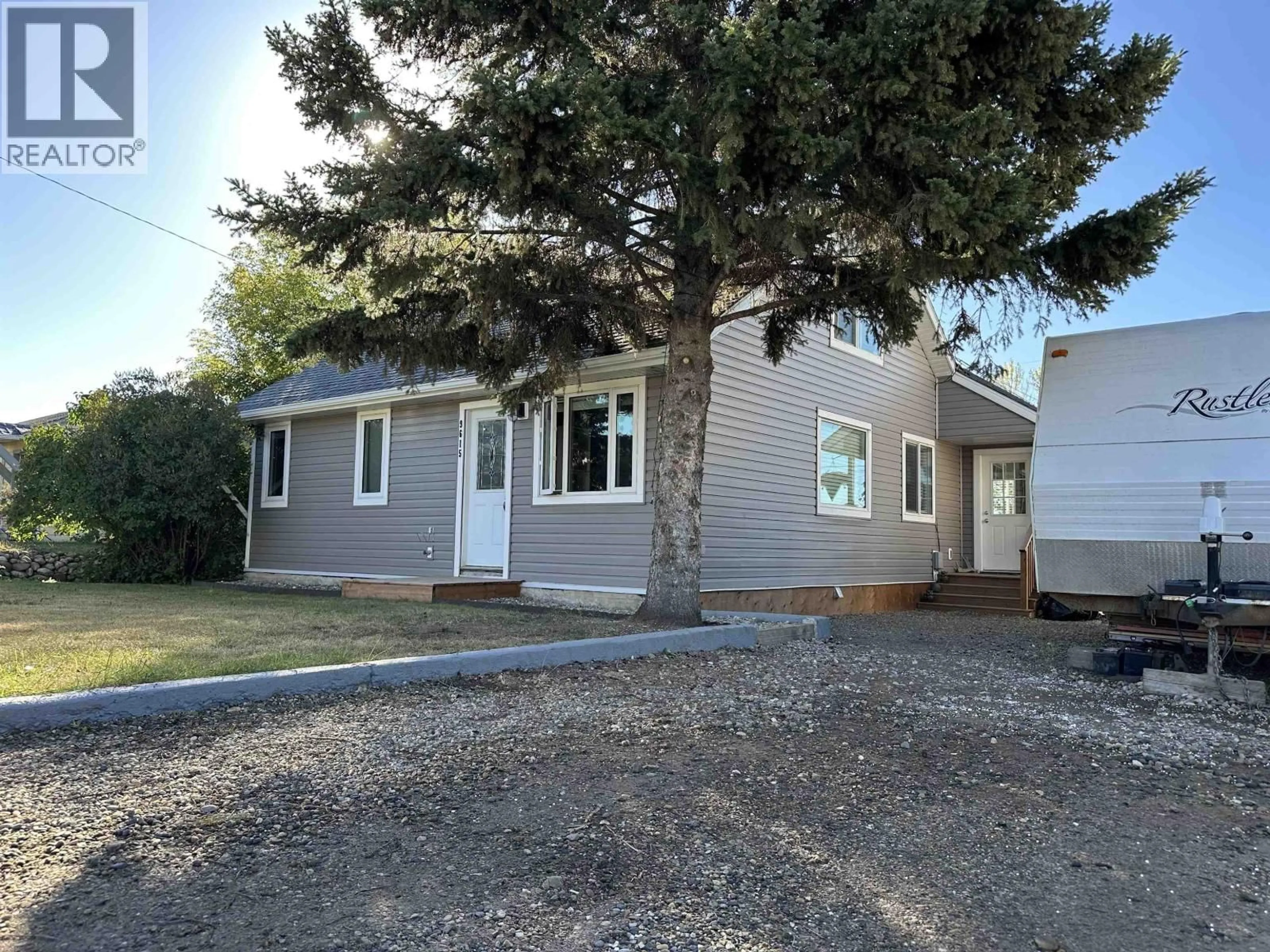 Home with vinyl exterior material, street for 9615 97 AVENUE, Fort St. John British Columbia V1J1N2