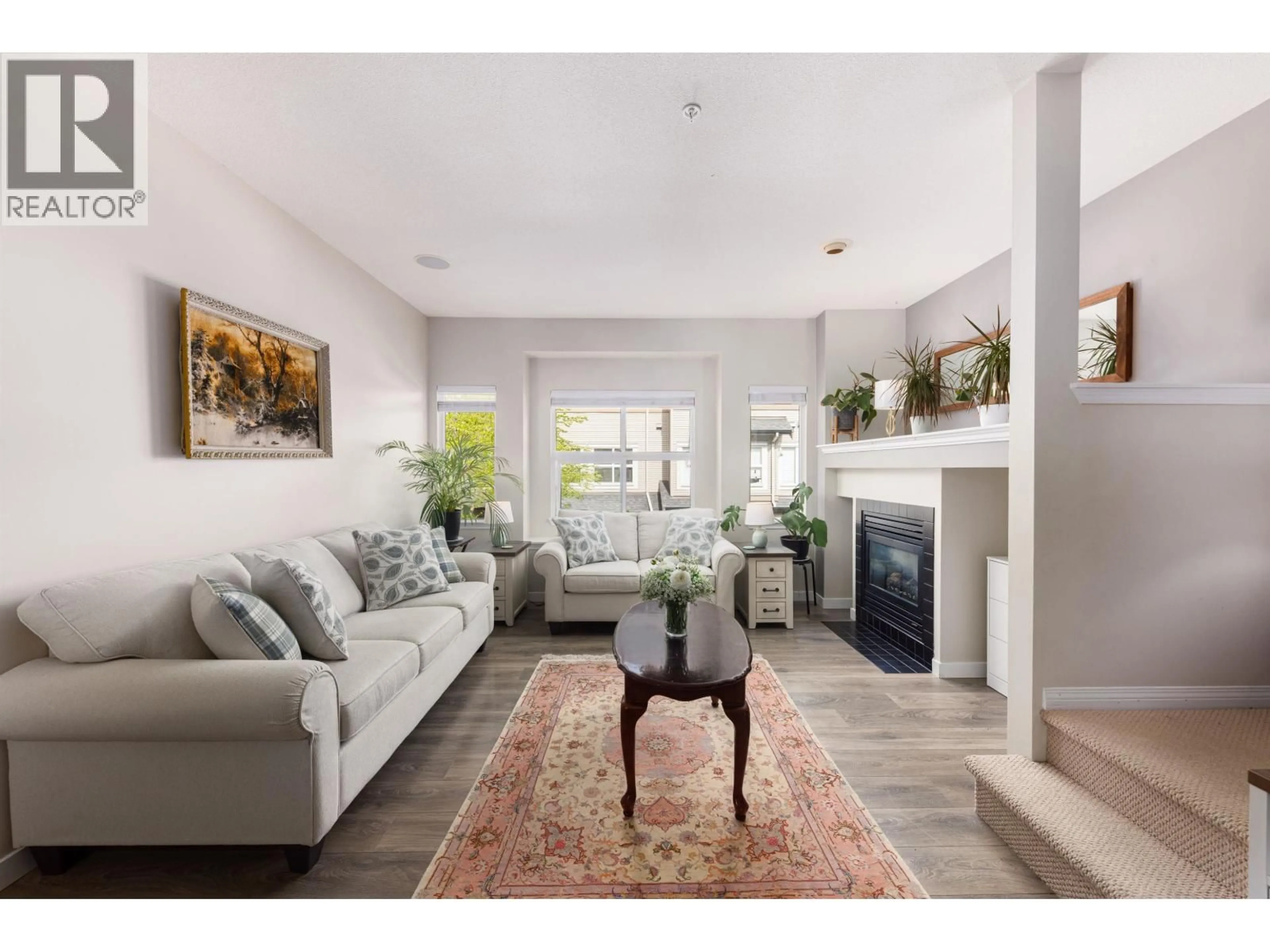 Living room with furniture, unknown for 102 - 1055 RIVERWOOD GATE, Port Coquitlam British Columbia V3B8C3