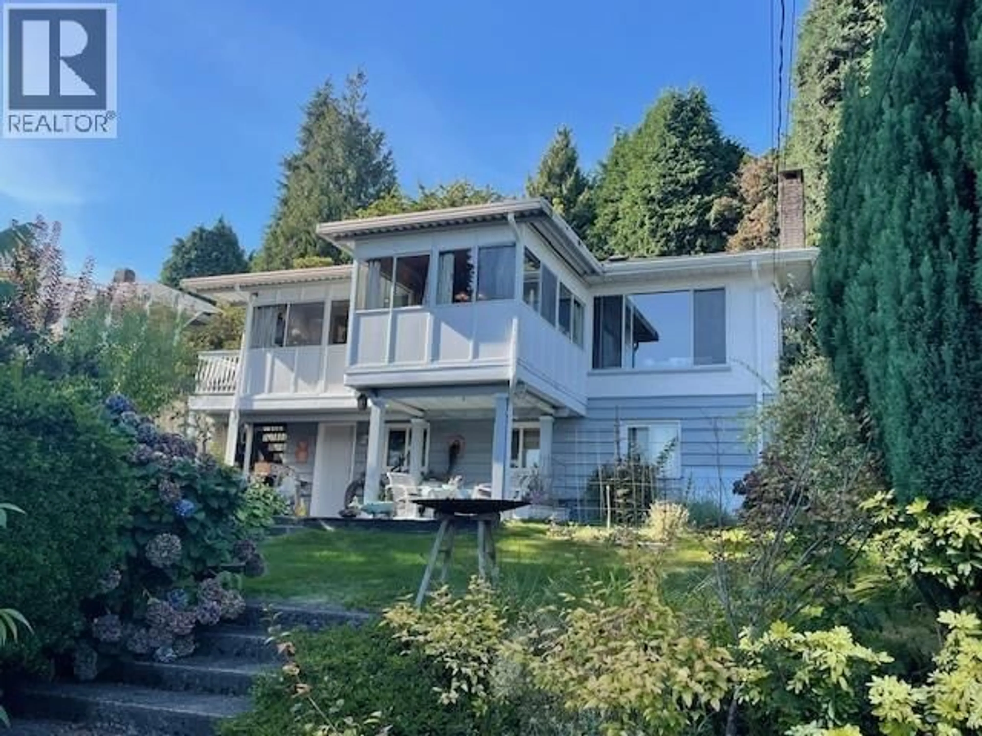 A pic from outside/outdoor area/front of a property/back of a property/a pic from drone, mountain view for 903 KEITH ROAD, North Vancouver British Columbia V7L1X1