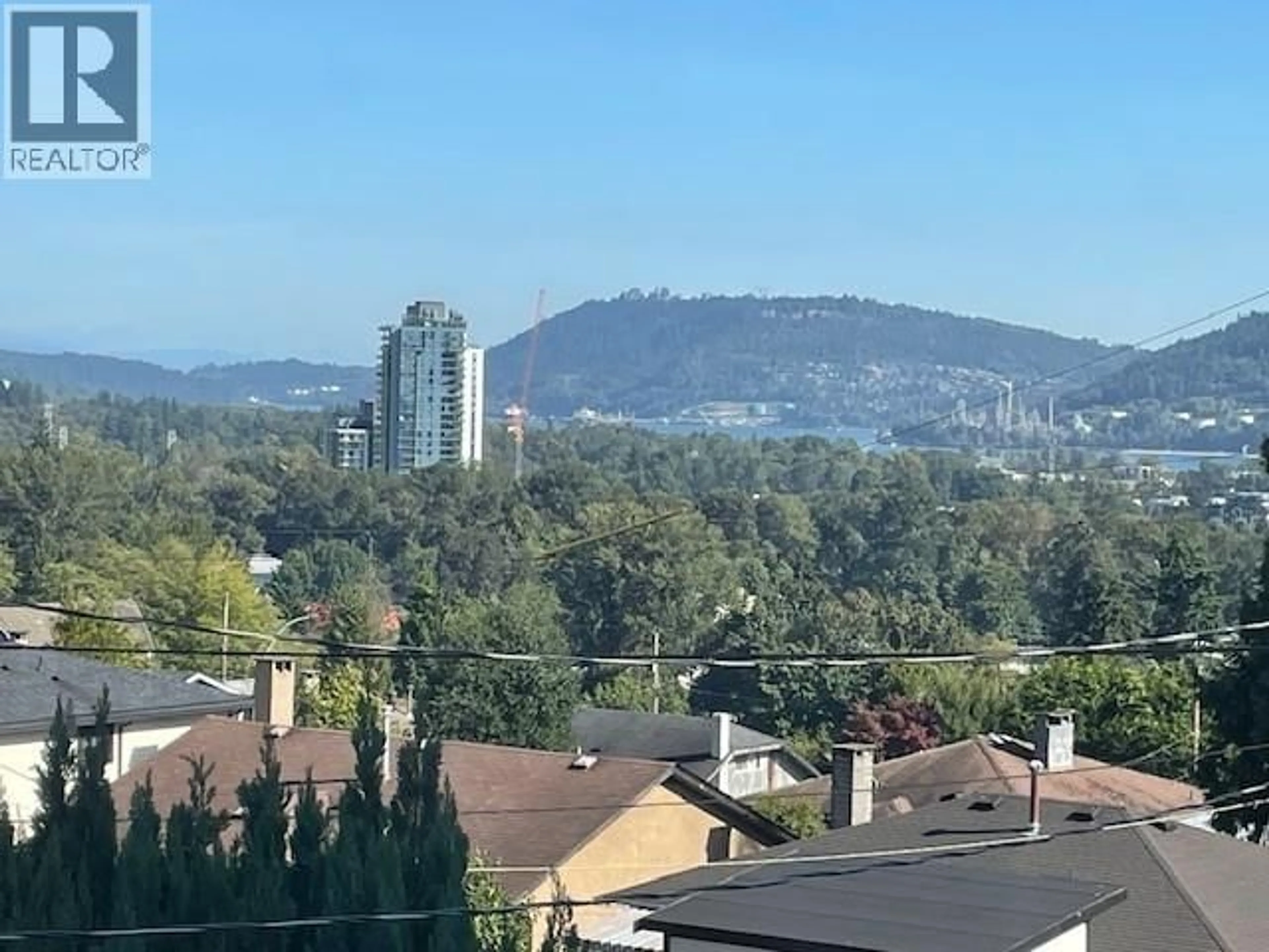 A pic from outside/outdoor area/front of a property/back of a property/a pic from drone, mountain view for 903 KEITH ROAD, North Vancouver British Columbia V7L1X1