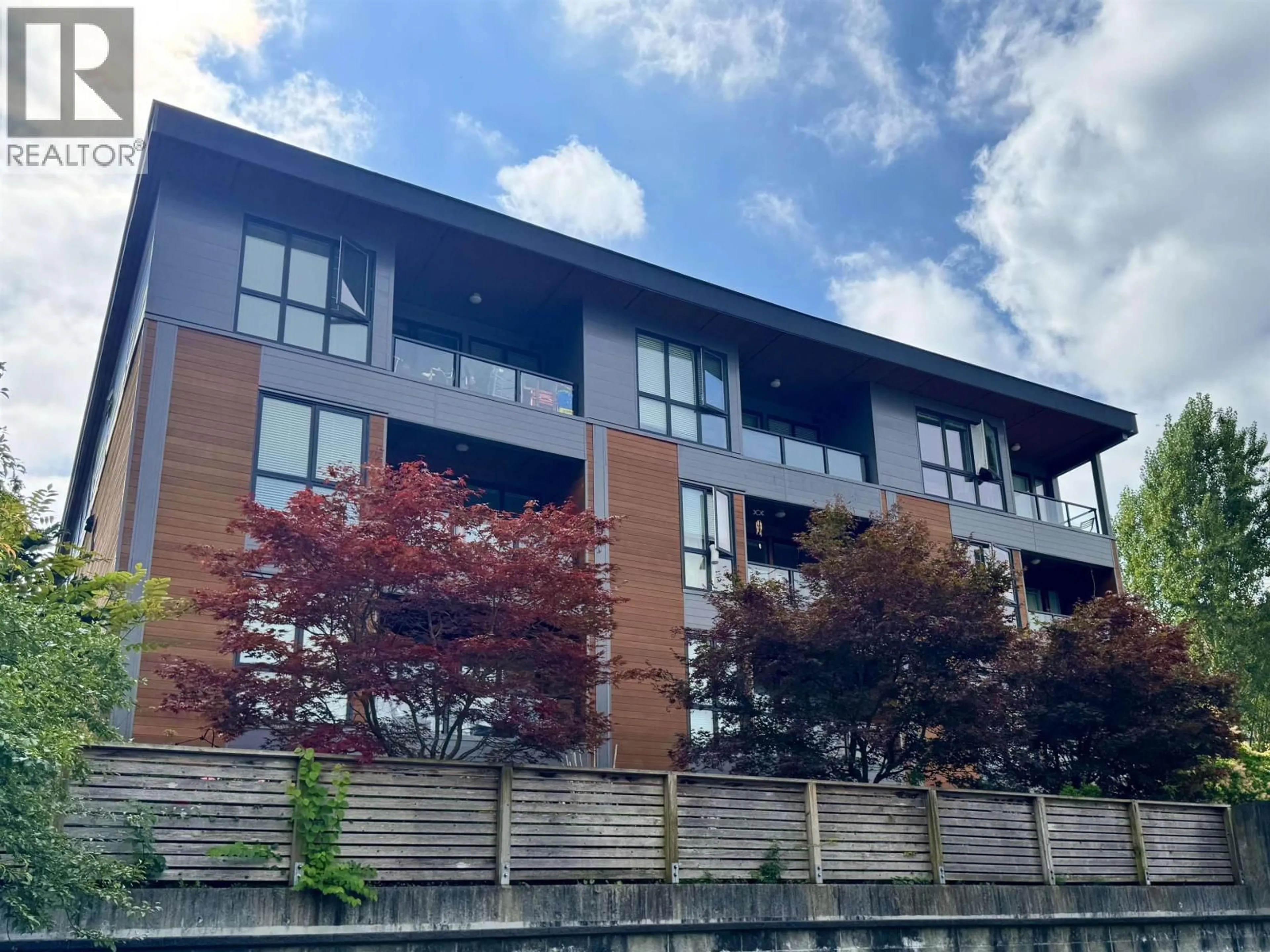 A pic from outside/outdoor area/front of a property/back of a property/a pic from drone, building for 306 - 2267 PITT RIVER ROAD, Port Coquitlam British Columbia V3C1R7