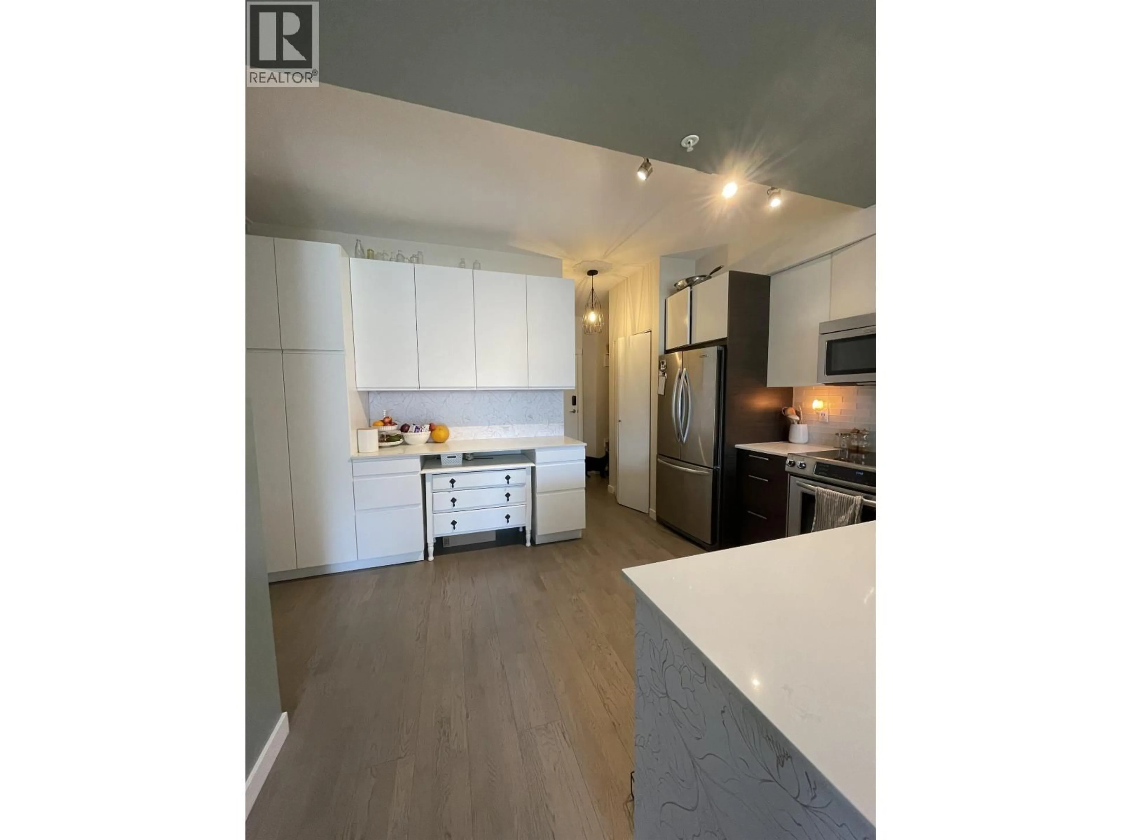 Open concept kitchen, wood/laminate floor for 306 - 2267 PITT RIVER ROAD, Port Coquitlam British Columbia V3C1R7
