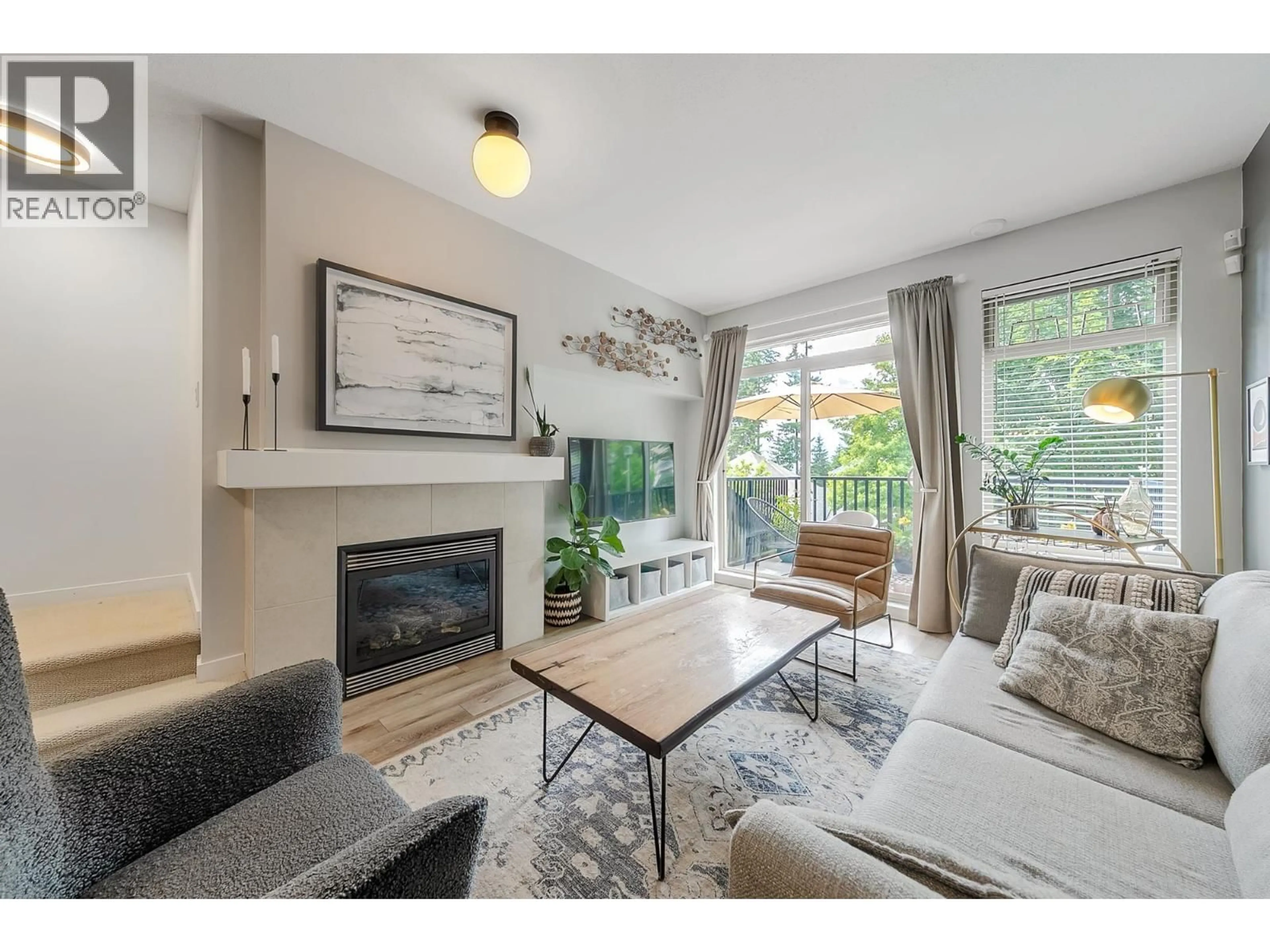 Living room with furniture, wood/laminate floor for 19 - 55 HAWTHORN DRIVE, Port Moody British Columbia V3H0B3
