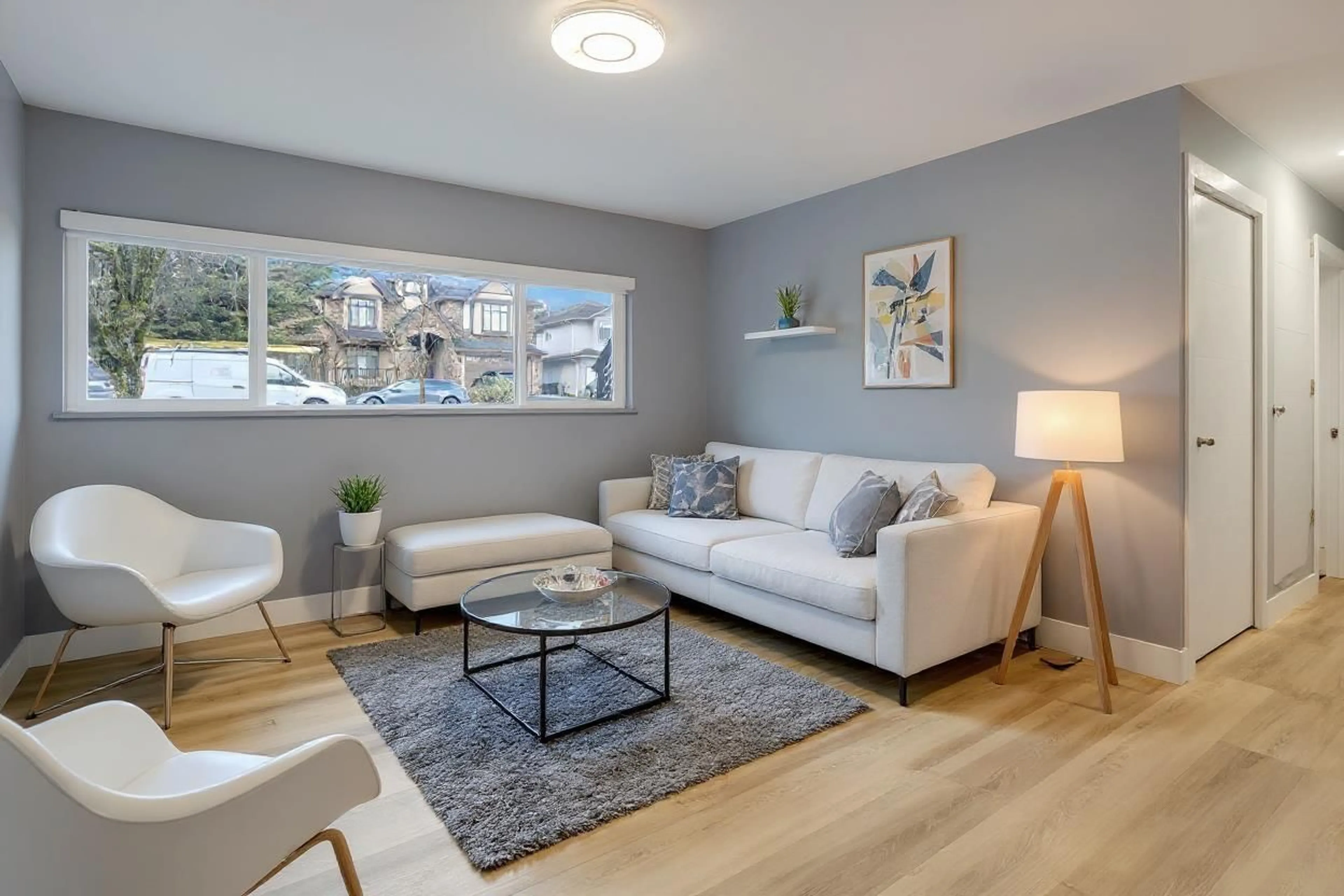 Living room with furniture, wood/laminate floor for 9024 123A, Surrey British Columbia V3V6K3