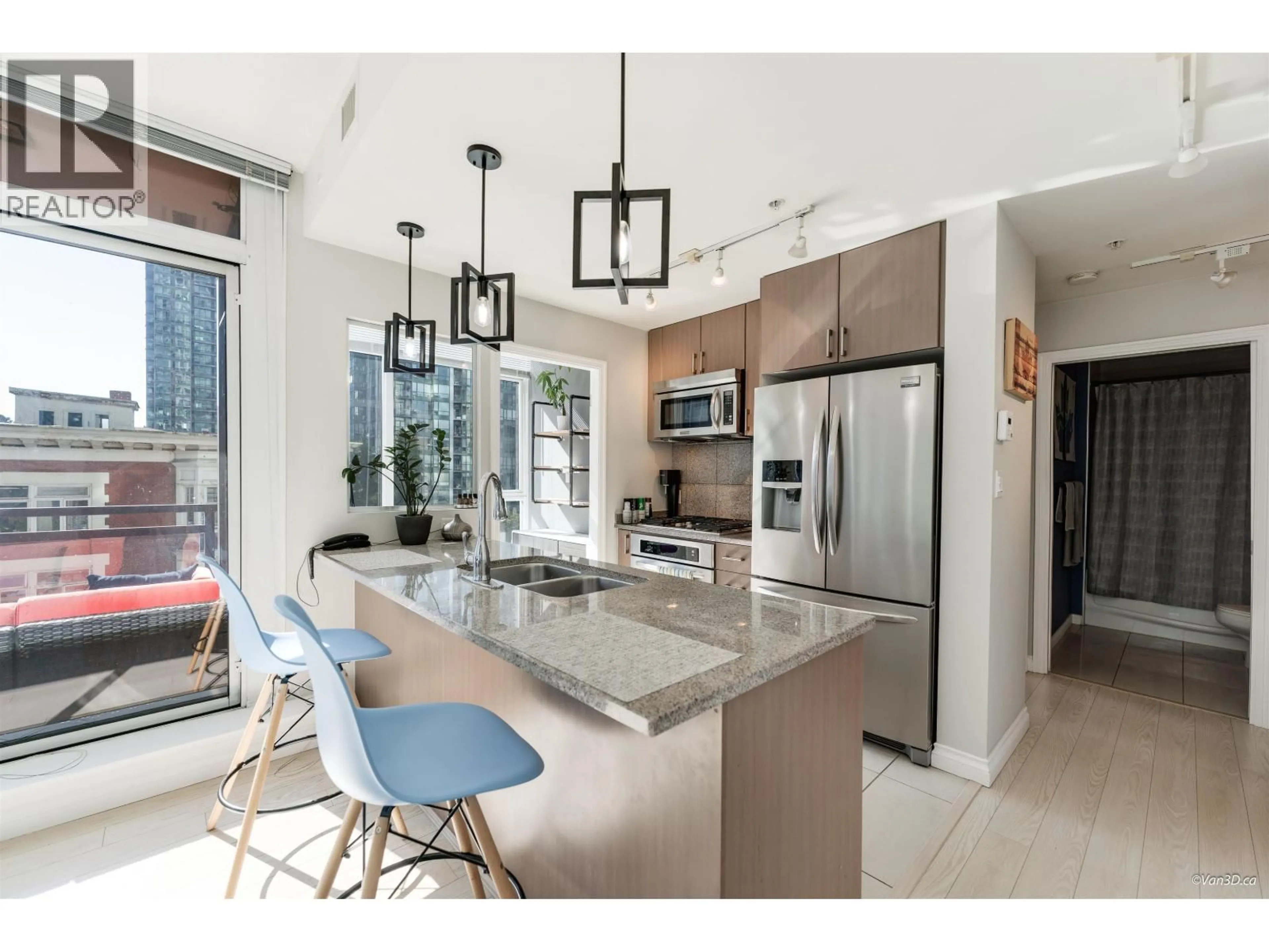 Open concept kitchen, ceramic/tile floor for 702 - 1211 MELVILLE STREET, Vancouver British Columbia V6E0A7