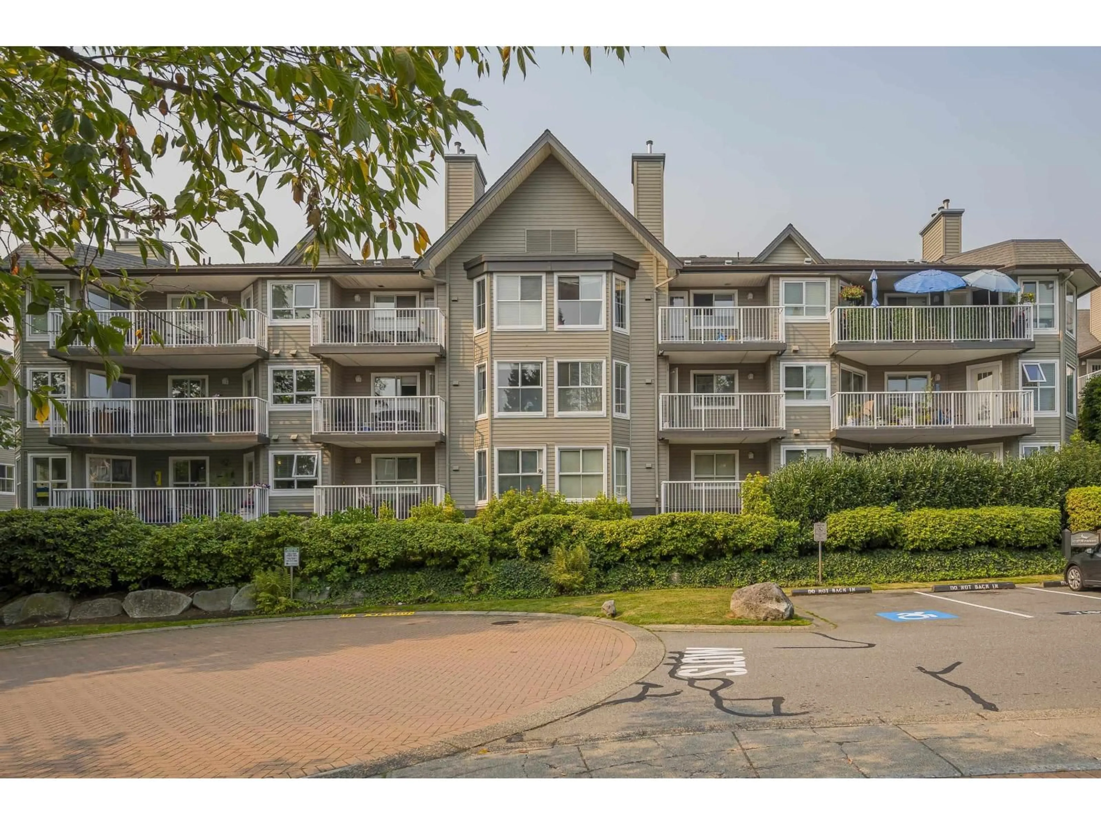 A pic from outside/outdoor area/front of a property/back of a property/a pic from drone, water/lake/river/ocean view for 105 - 15120 108, Surrey British Columbia V3R0T7
