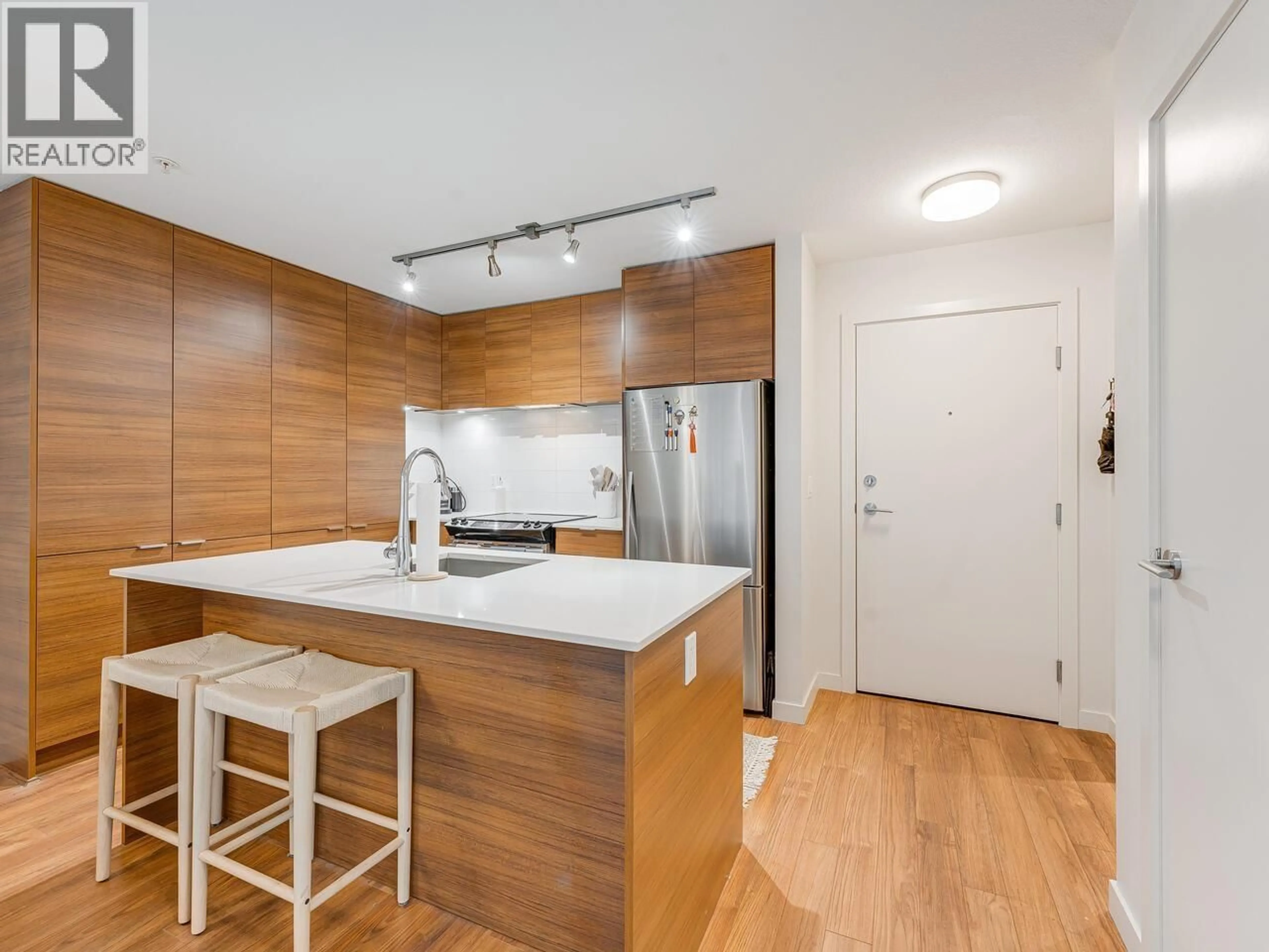Standard kitchen, wood/laminate floor for 313 - 1677 LLOYD AVENUE, North Vancouver British Columbia V7P0B1