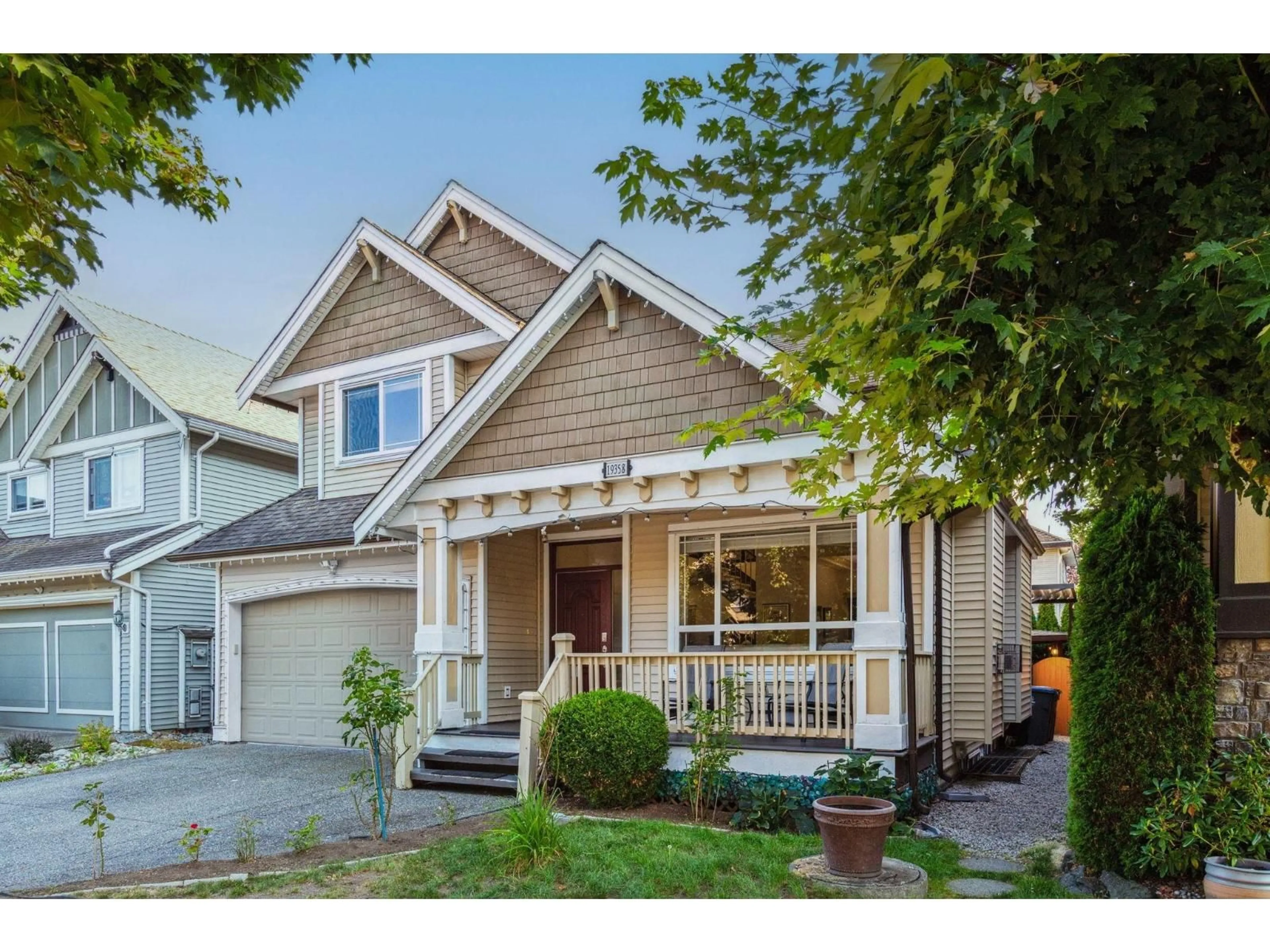 Home with vinyl exterior material, street for 19358 73B, Surrey British Columbia V4N5Y2