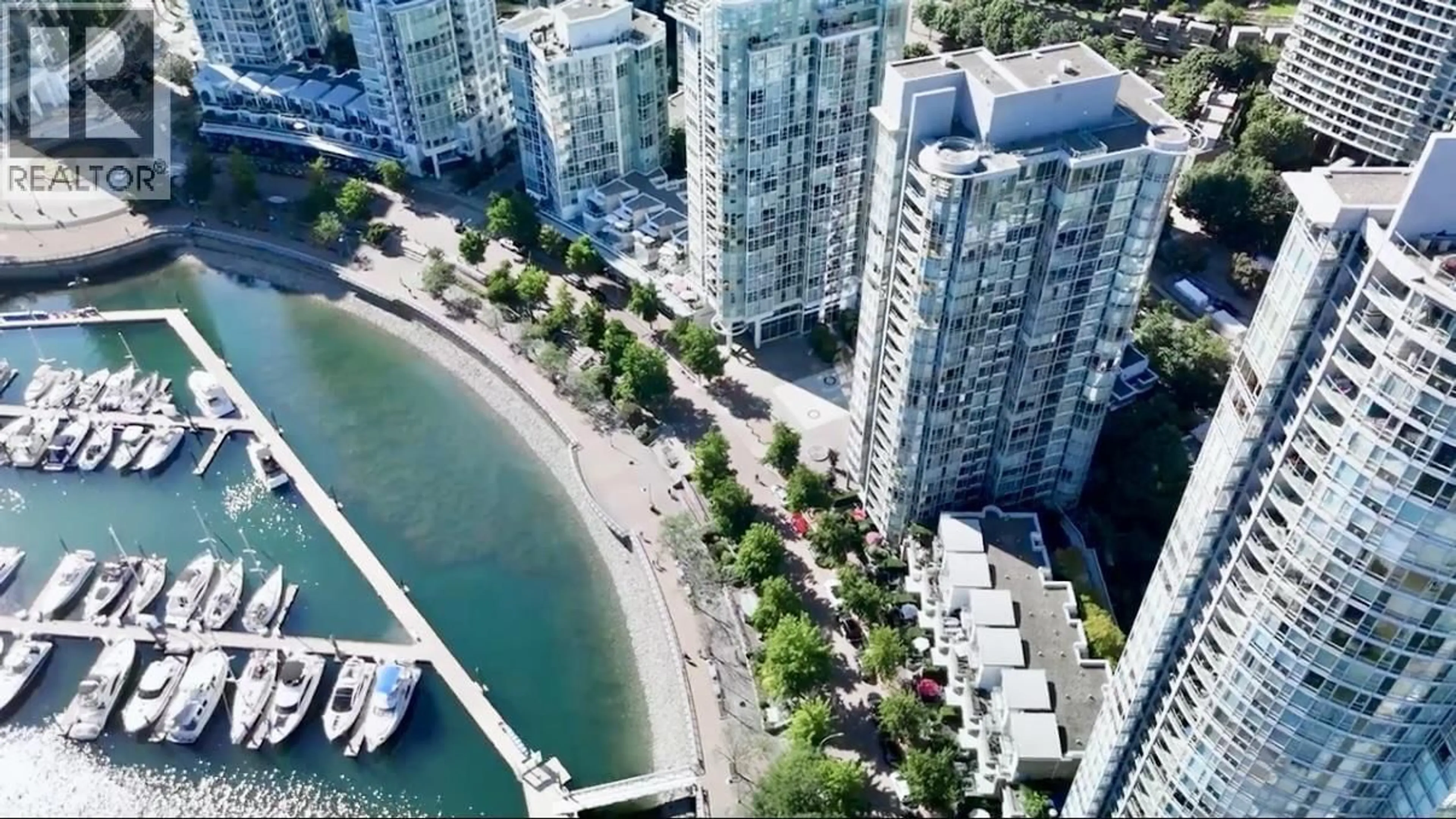 A pic from outside/outdoor area/front of a property/back of a property/a pic from drone, city buildings view from balcony for 707 - 1067 MARINASIDE CRESCENT, Vancouver British Columbia V6Z3A4