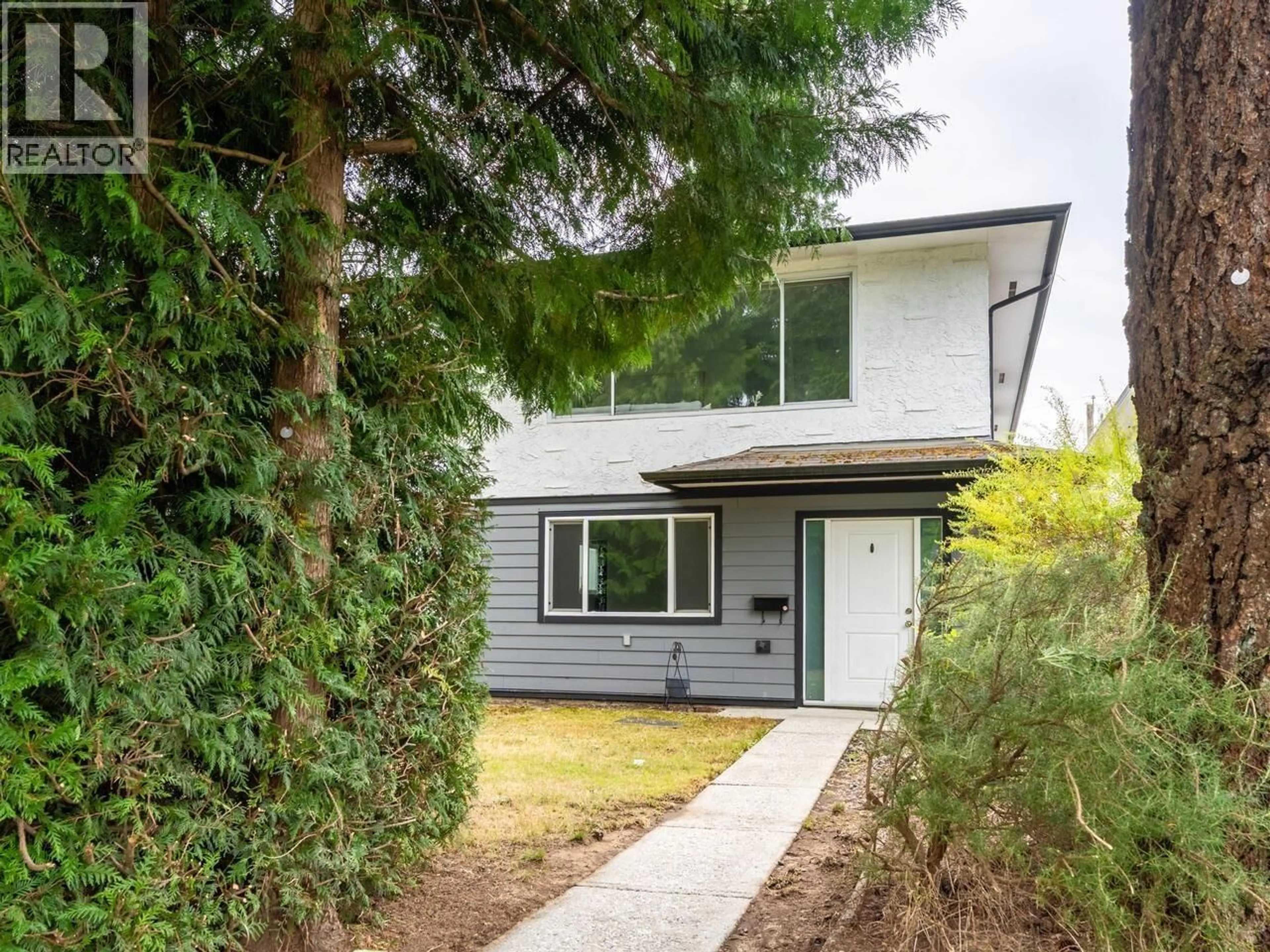 Home with vinyl exterior material, street for 1732 PRAIRIE AVENUE, Port Coquitlam British Columbia V3B1V1