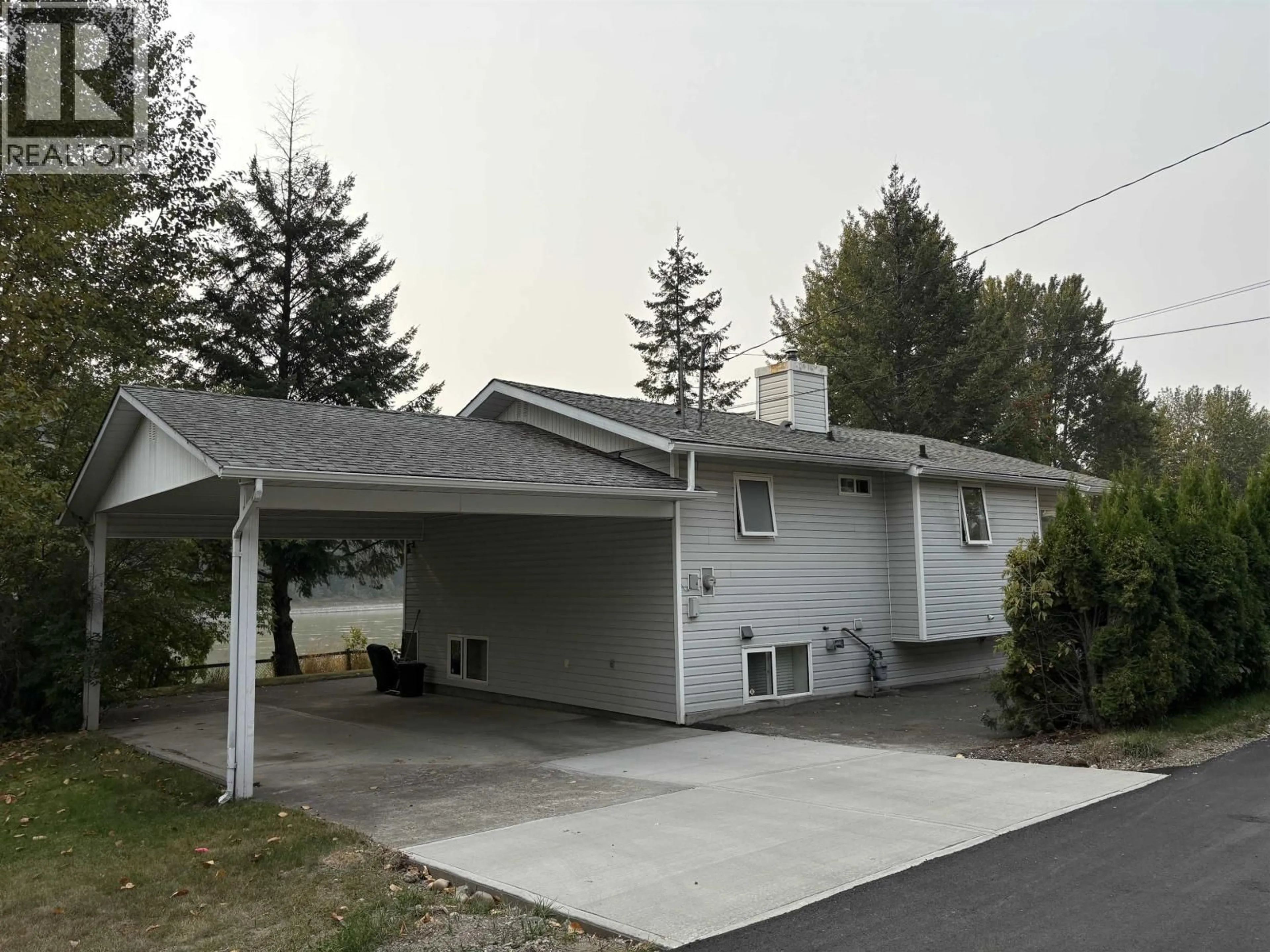 Home with vinyl exterior material, street for 1199 HOUSTON LANE, Prince George British Columbia V2L4M9
