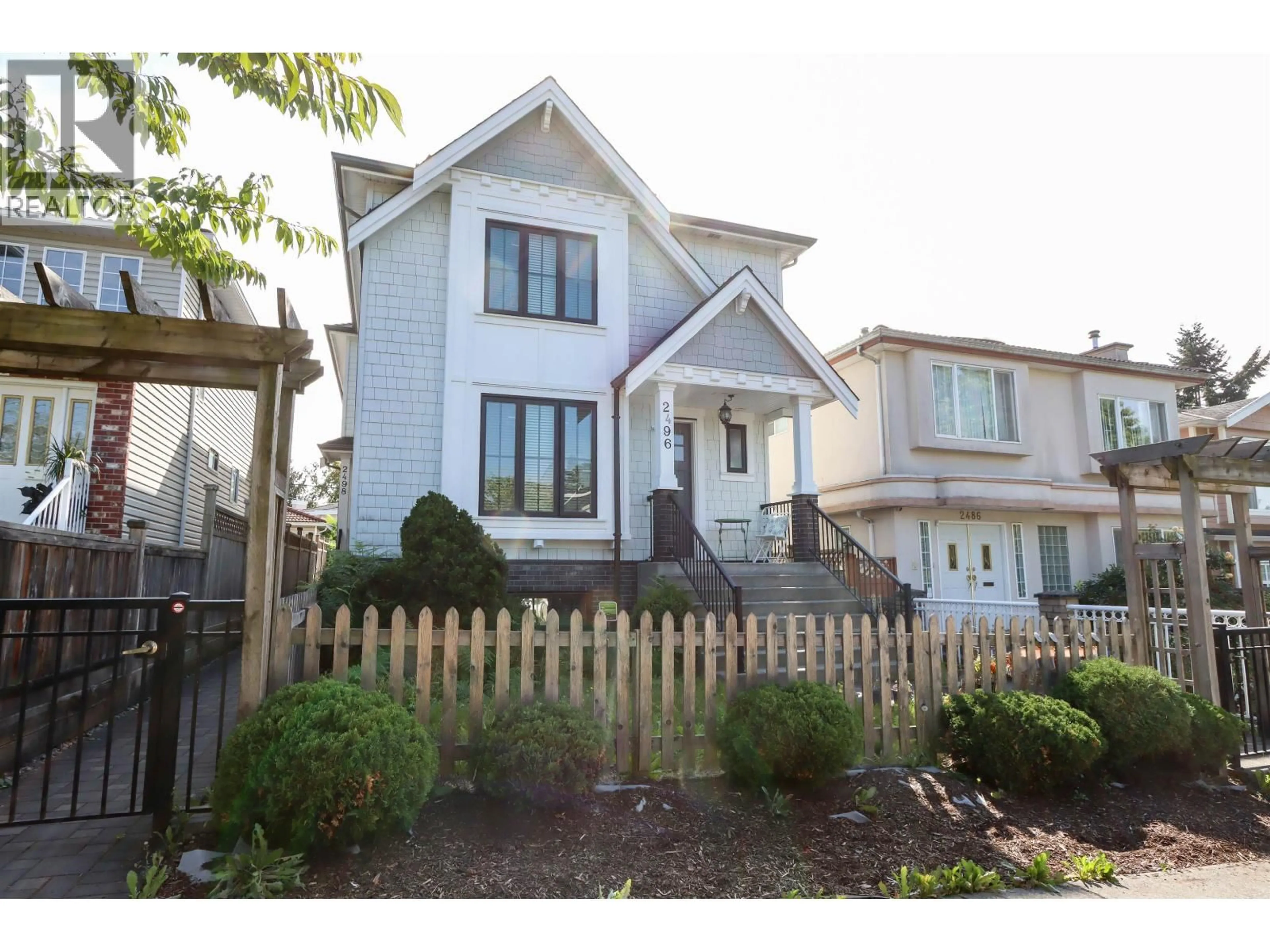Home with vinyl exterior material, street for 2496 BROCK STREET, Vancouver British Columbia V5R2R4