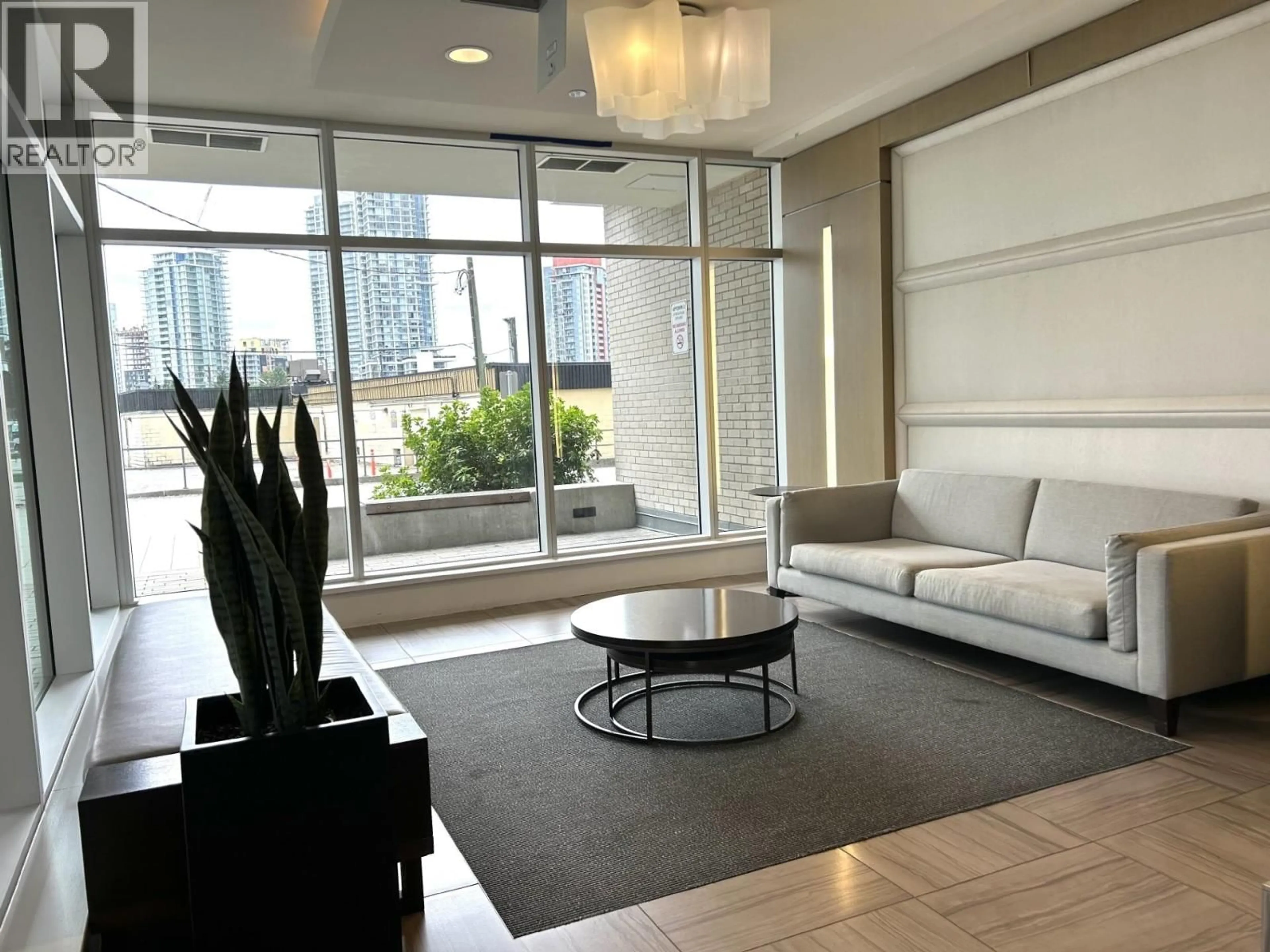 Living room with furniture, unknown for 1707 - 570 EMERSON STREET, Coquitlam British Columbia V3J0G3