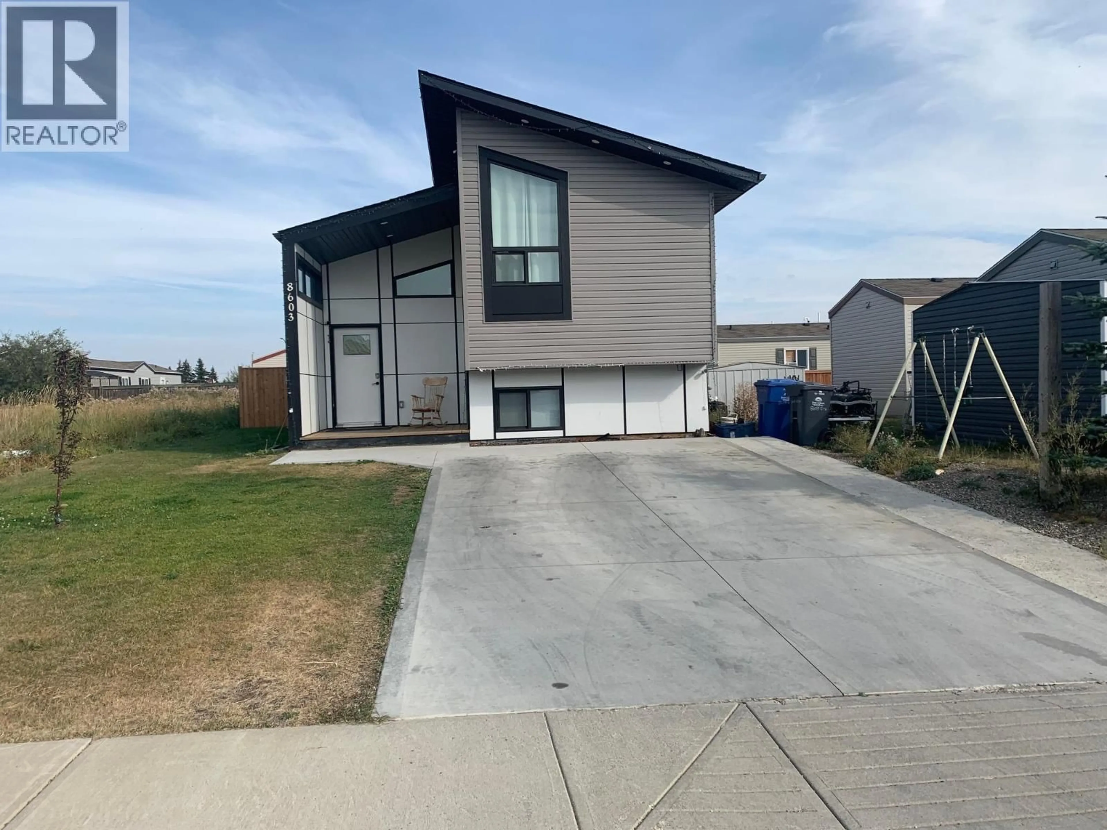 Home with vinyl exterior material, street for 8603 81 STREET, Fort St. John British Columbia V1J0M4