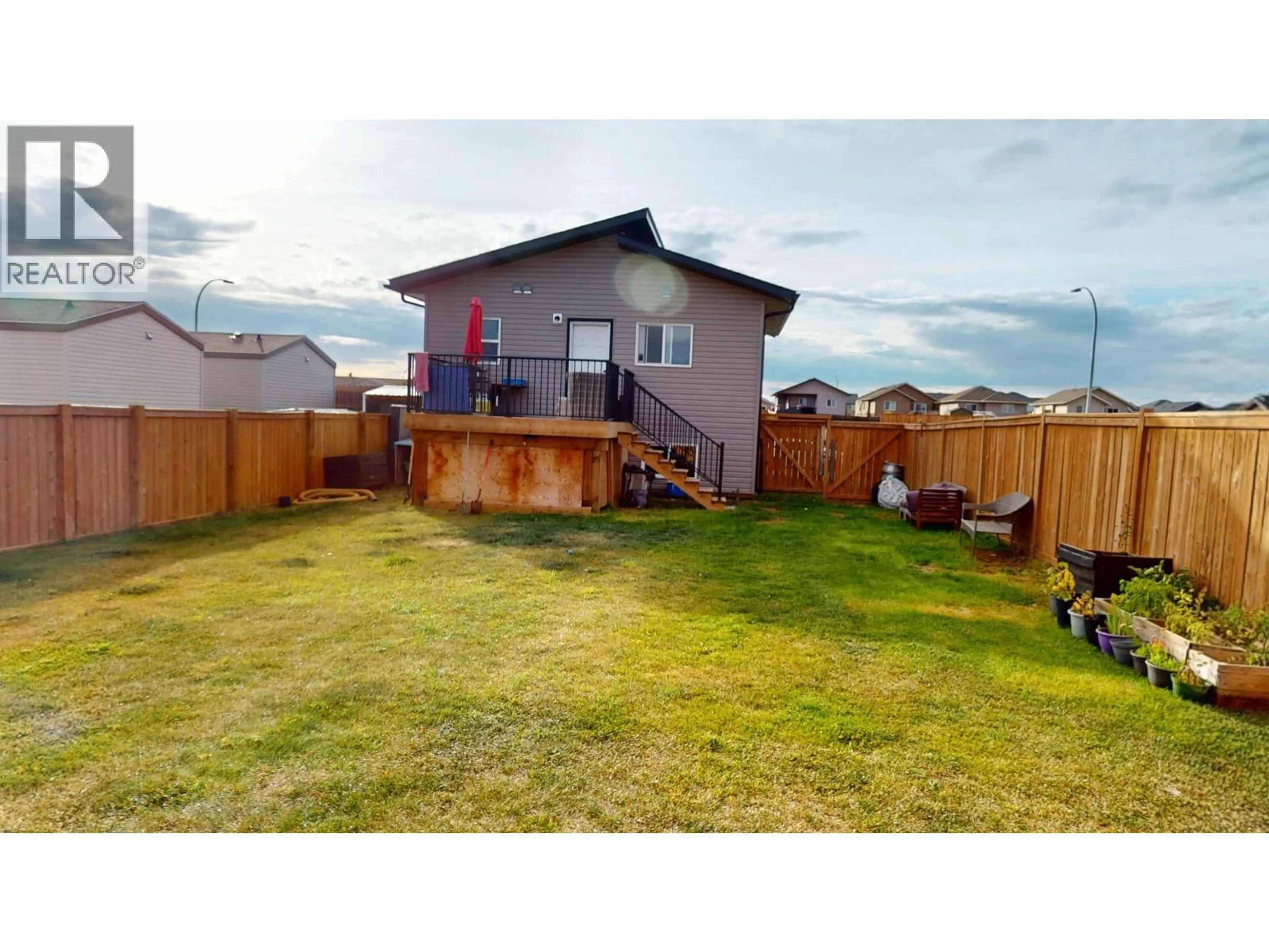 A pic from outside/outdoor area/front of a property/back of a property/a pic from drone, unknown for 8603 81 STREET, Fort St. John British Columbia V1J0M4