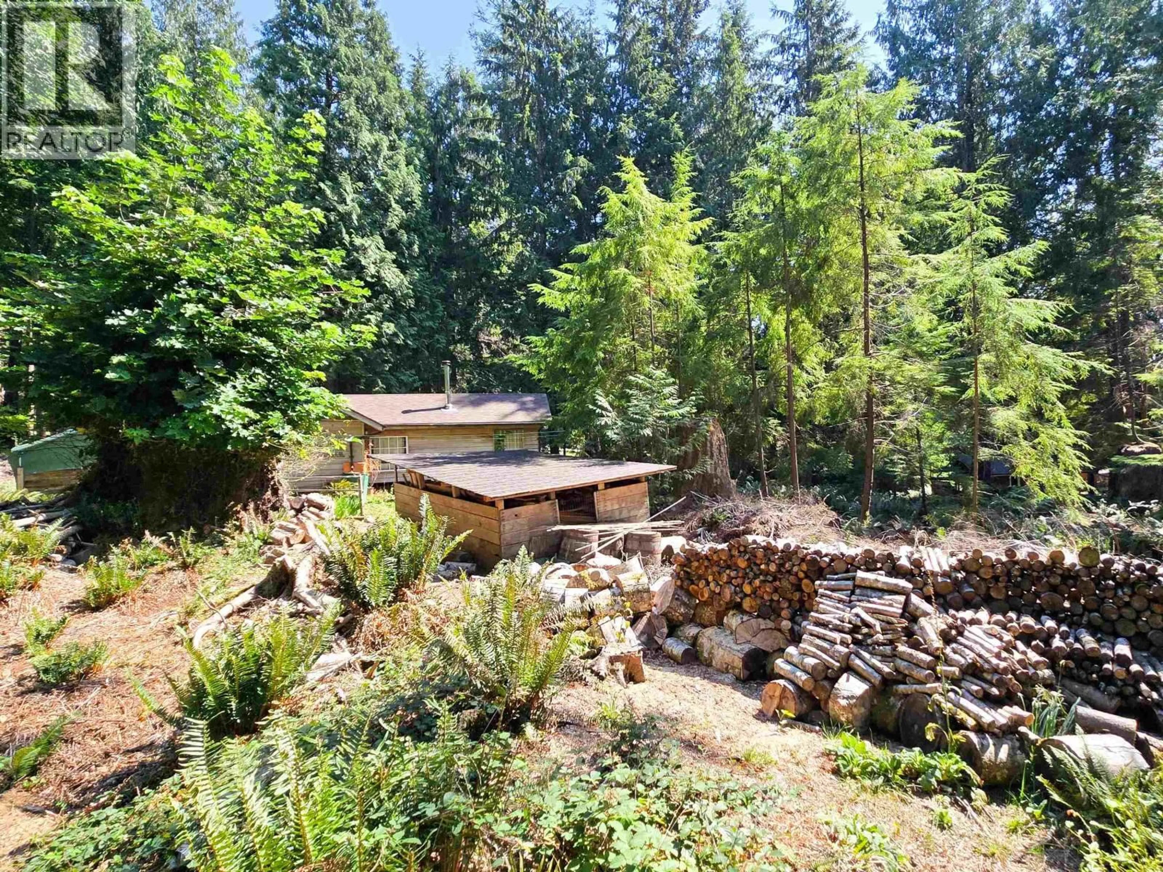 A pic from outside/outdoor area/front of a property/back of a property/a pic from drone, forest/trees view for 793 ANDY'S BAY ROAD, Gambier Island British Columbia V0N1V0