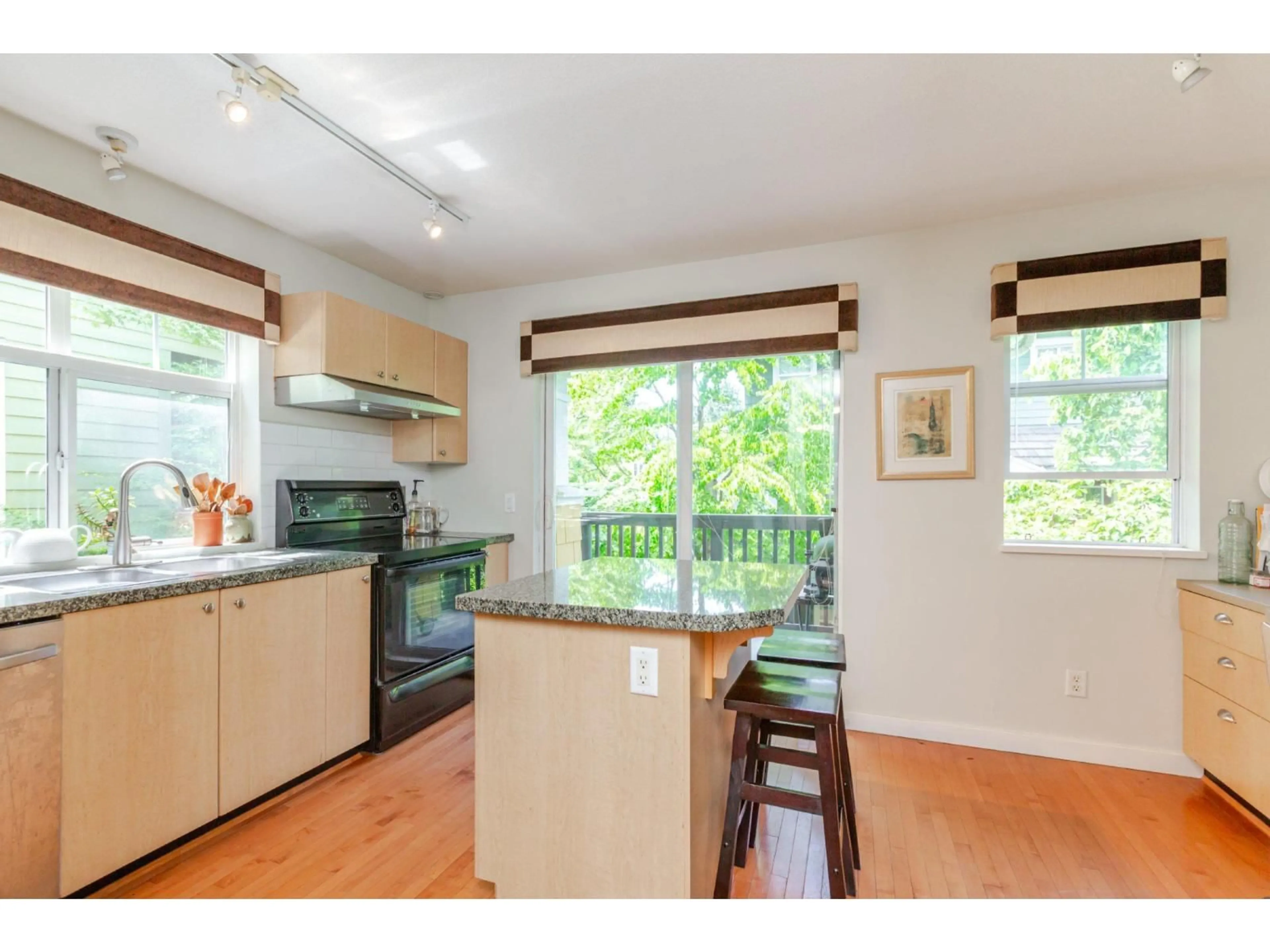 Open concept kitchen, wood/laminate floor for 6 - 15233 34, Surrey British Columbia V3Z2T7