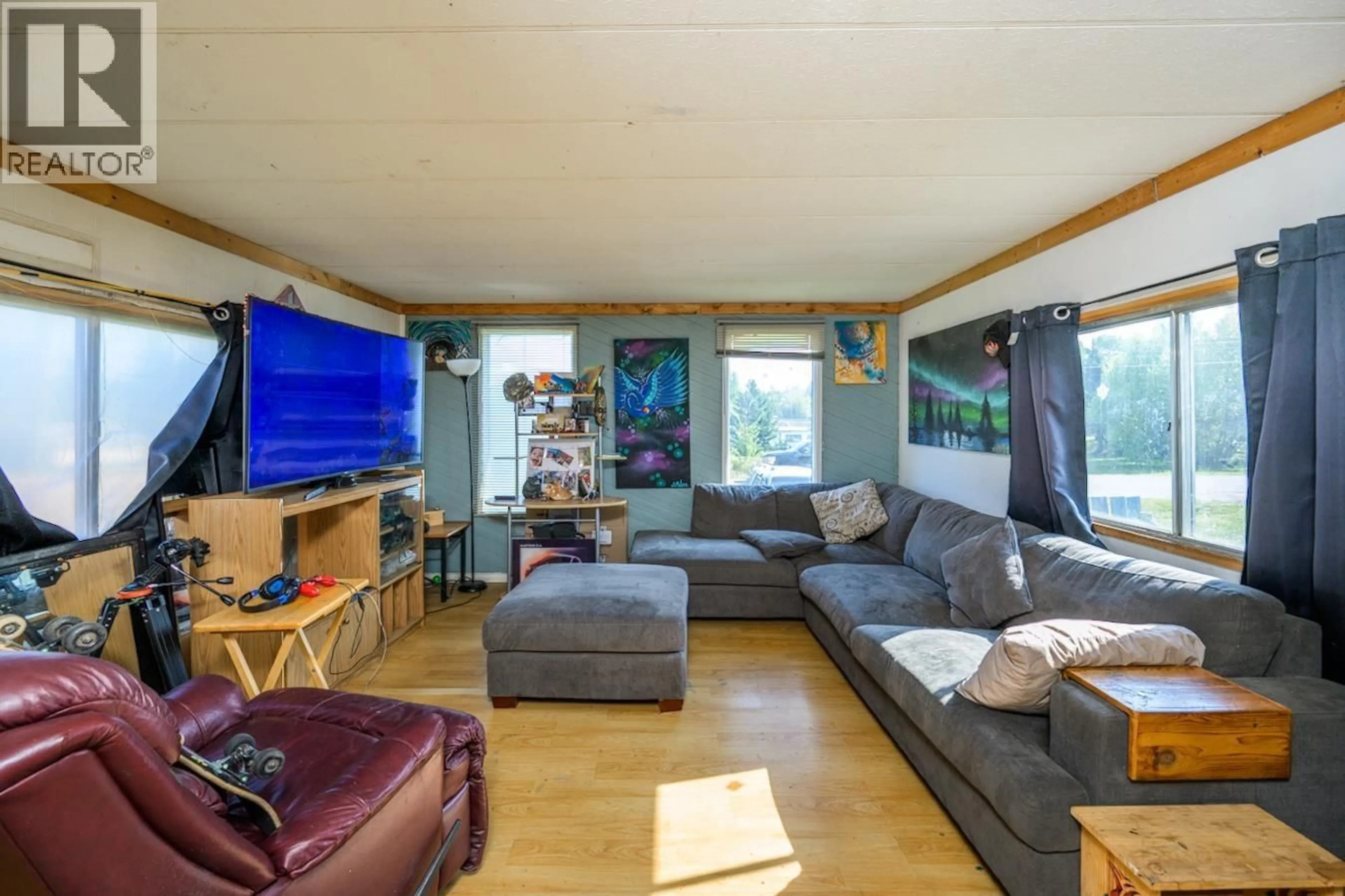 Living room with furniture, wood/laminate floor for 2127 MCLAREN ROAD, Prince George British Columbia V2N6T8