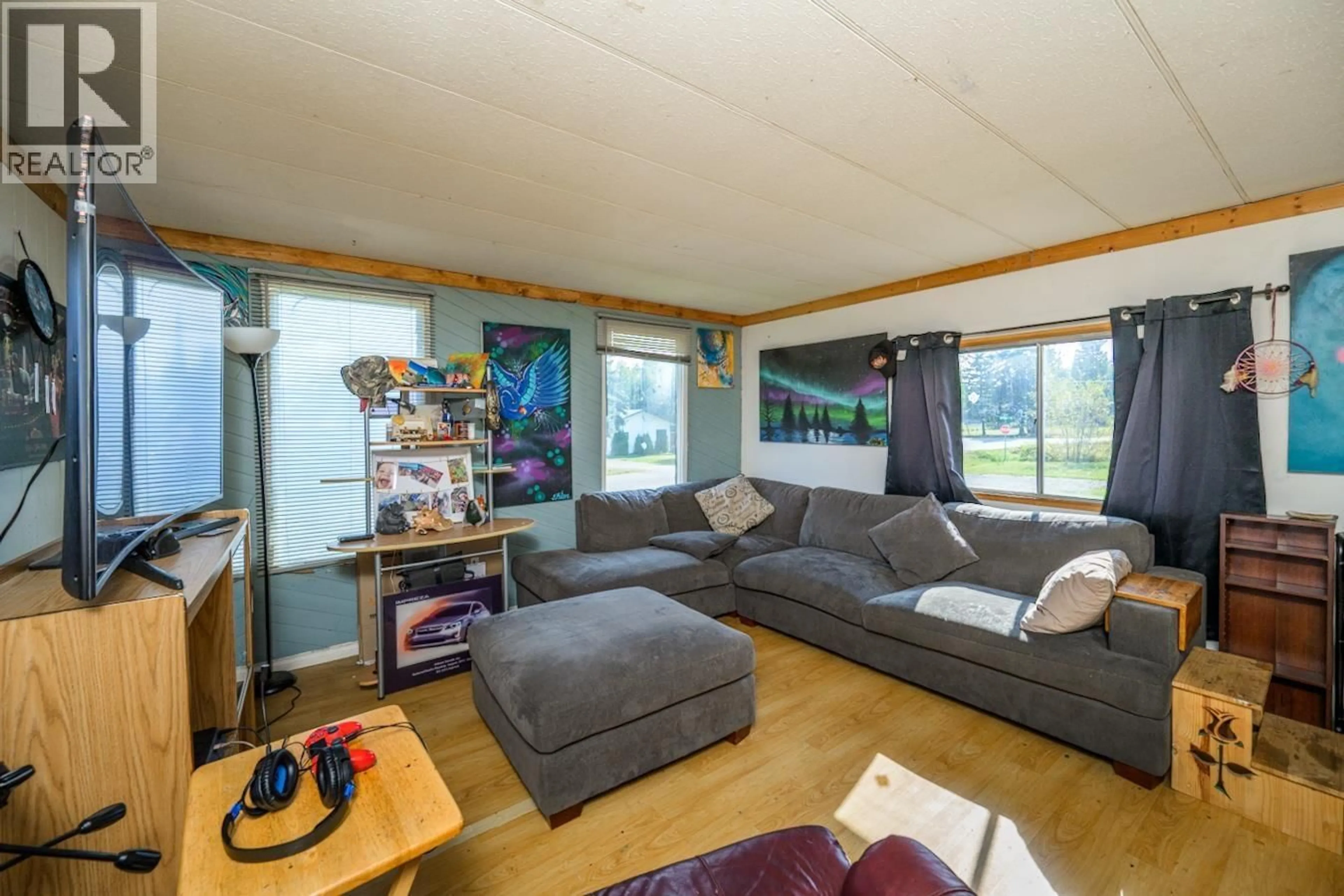 Living room with furniture, wood/laminate floor for 2127 MCLAREN ROAD, Prince George British Columbia V2N6T8