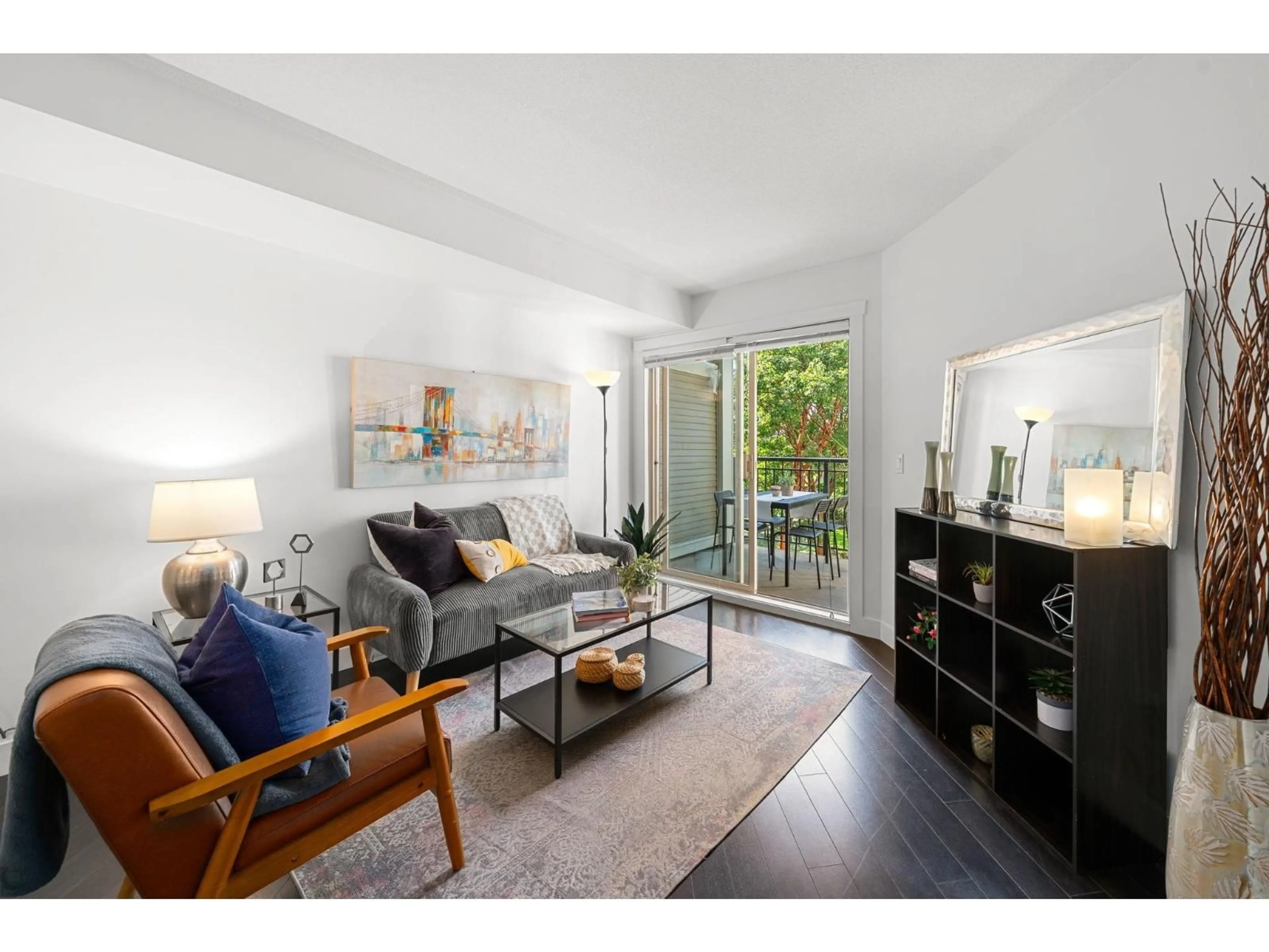 Living room with furniture, wood/laminate floor for 209 - 13555 GATEWAY, Surrey British Columbia V3T0B5