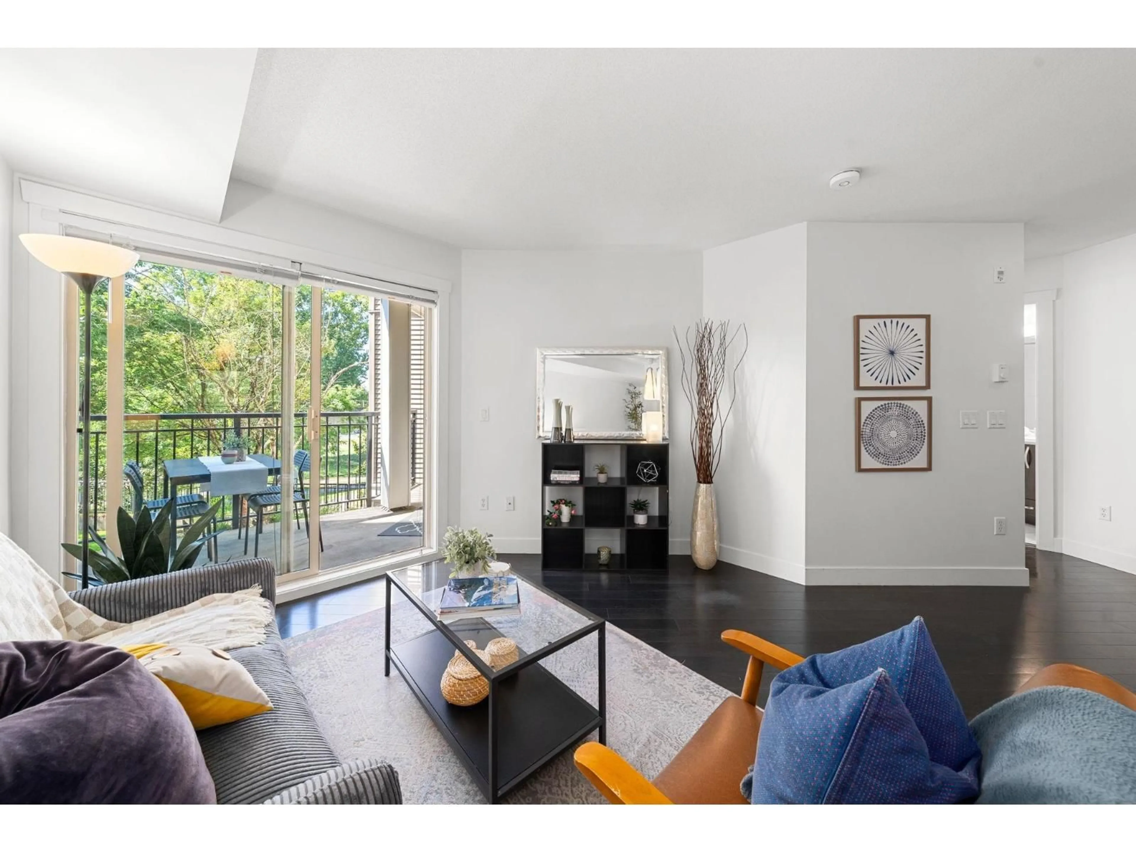 Living room with furniture, wood/laminate floor for 209 - 13555 GATEWAY, Surrey British Columbia V3T0B5