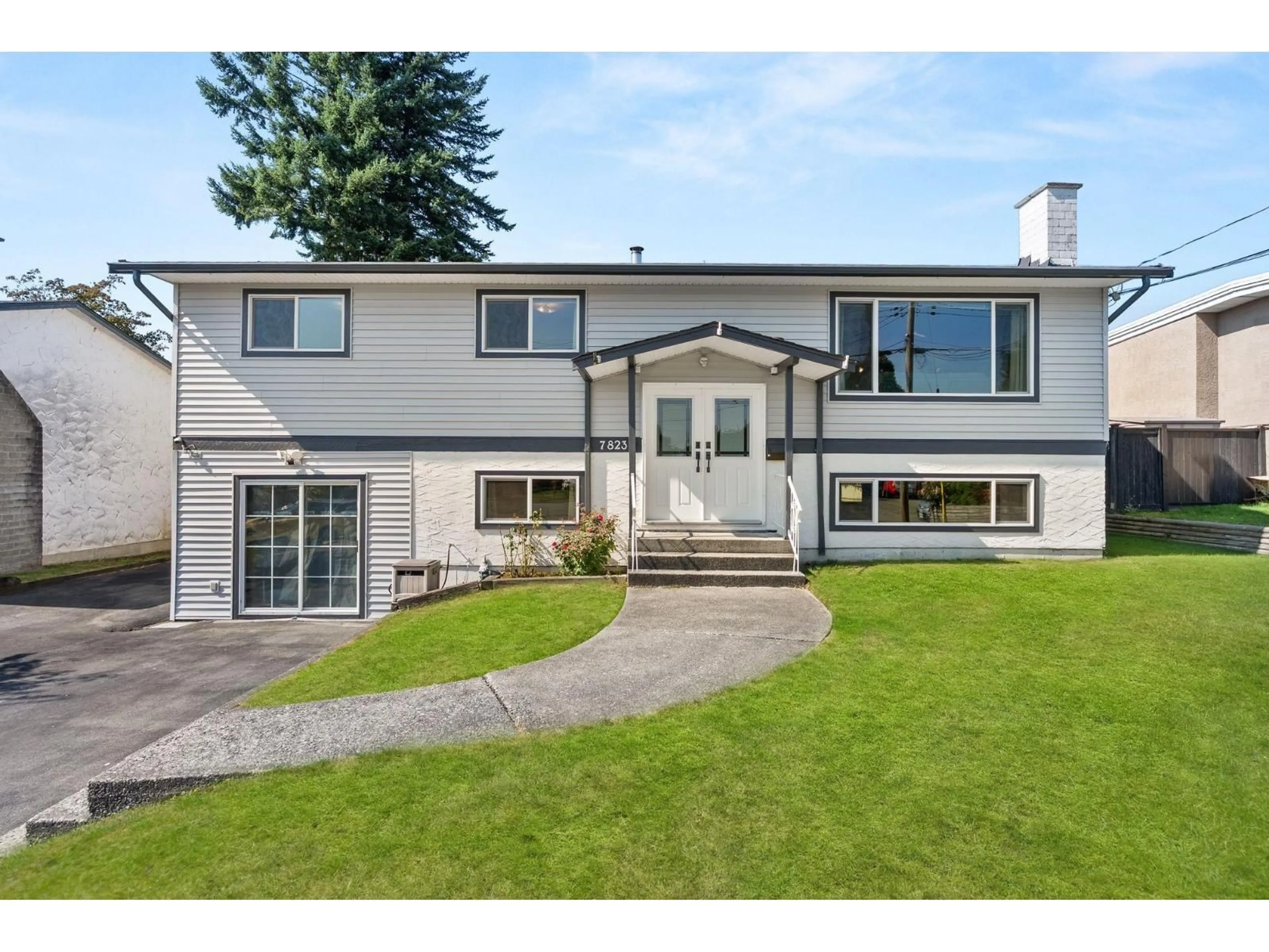 Home with vinyl exterior material, street for 7823 BREMRIDGE, Delta British Columbia V4C5E3