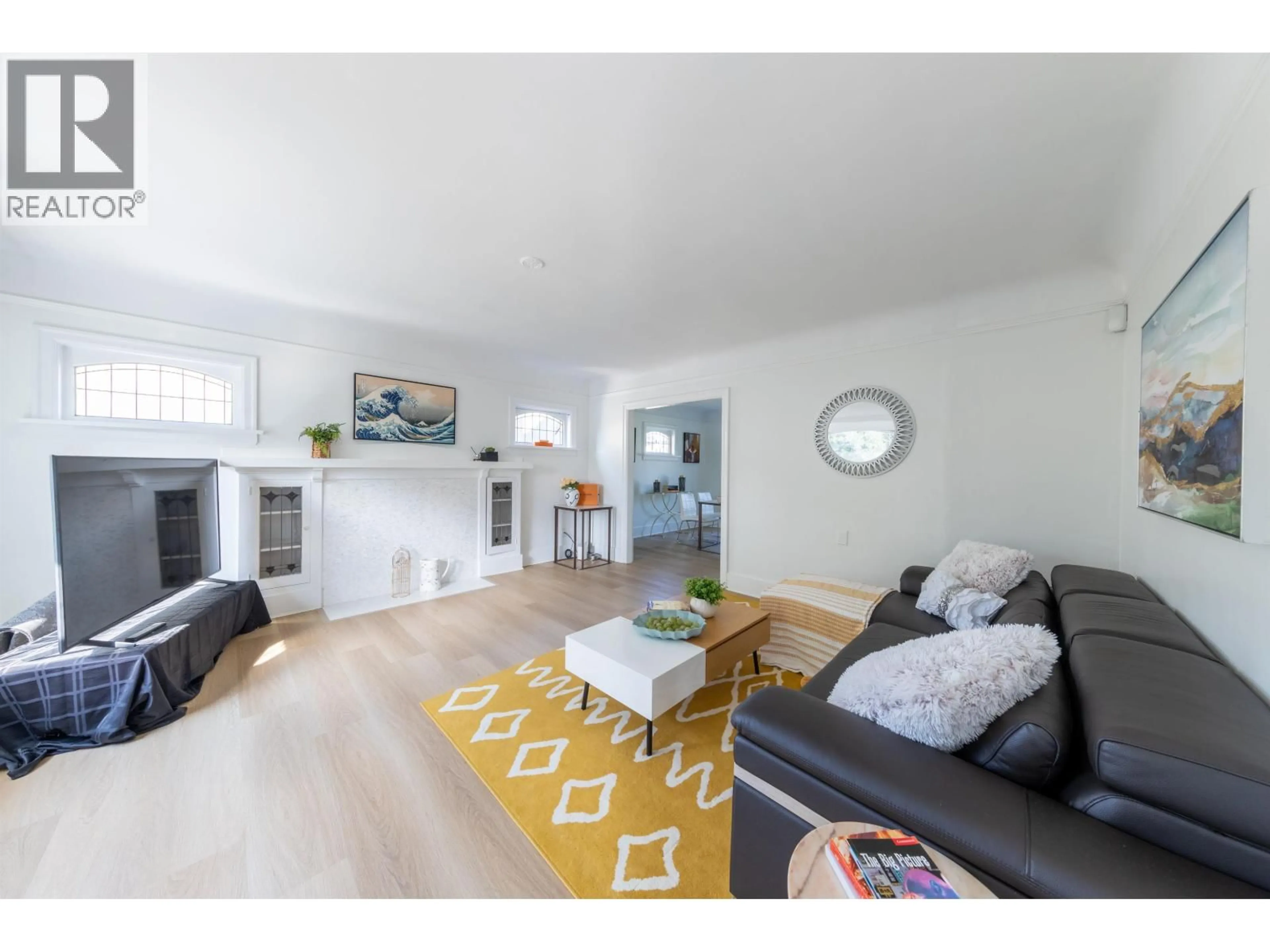 Living room with furniture, wood/laminate floor for 3719 3RD AVENUE, Vancouver British Columbia V6R1M2