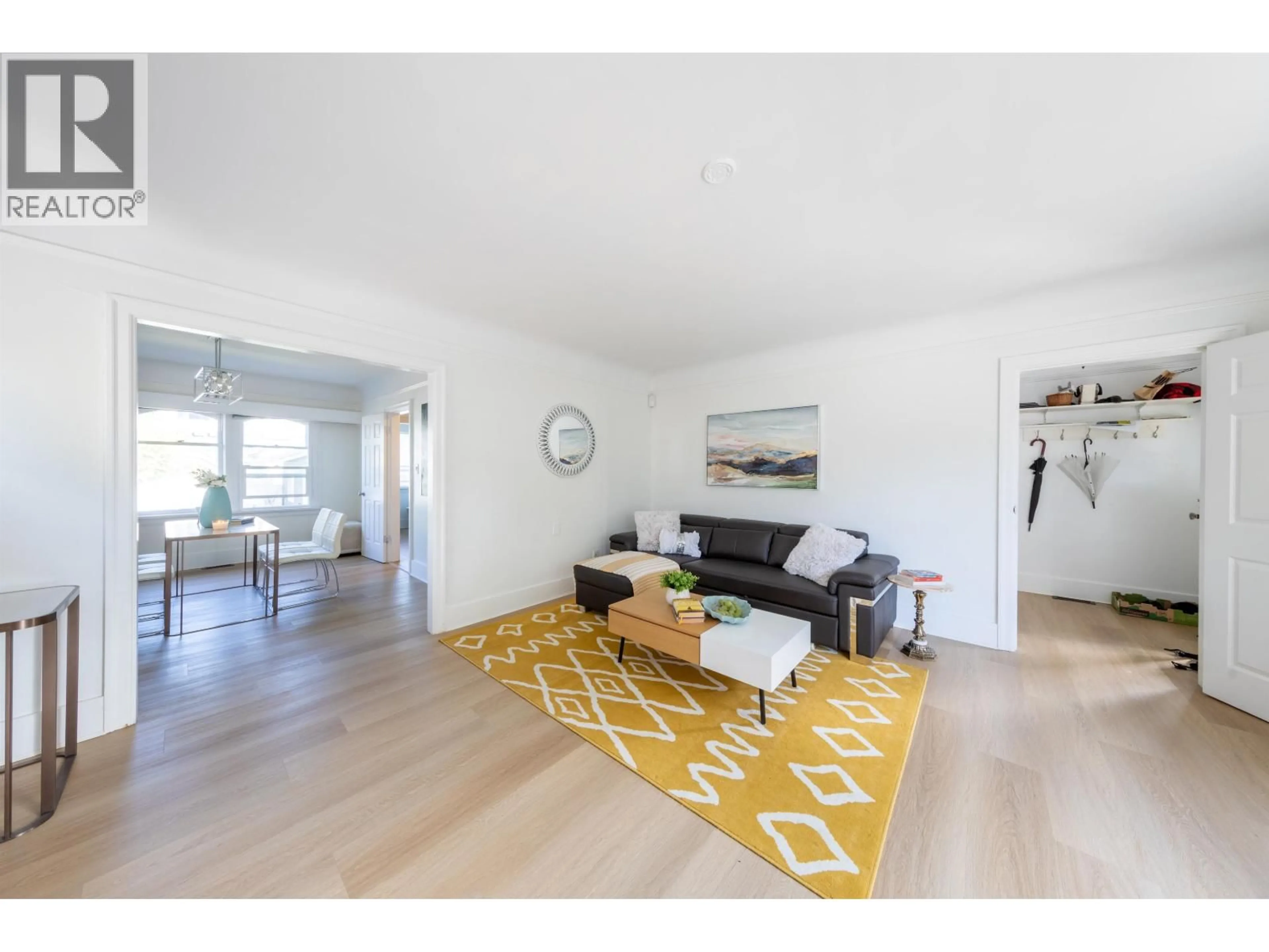 Living room with furniture, wood/laminate floor for 3719 3RD AVENUE, Vancouver British Columbia V6R1M2