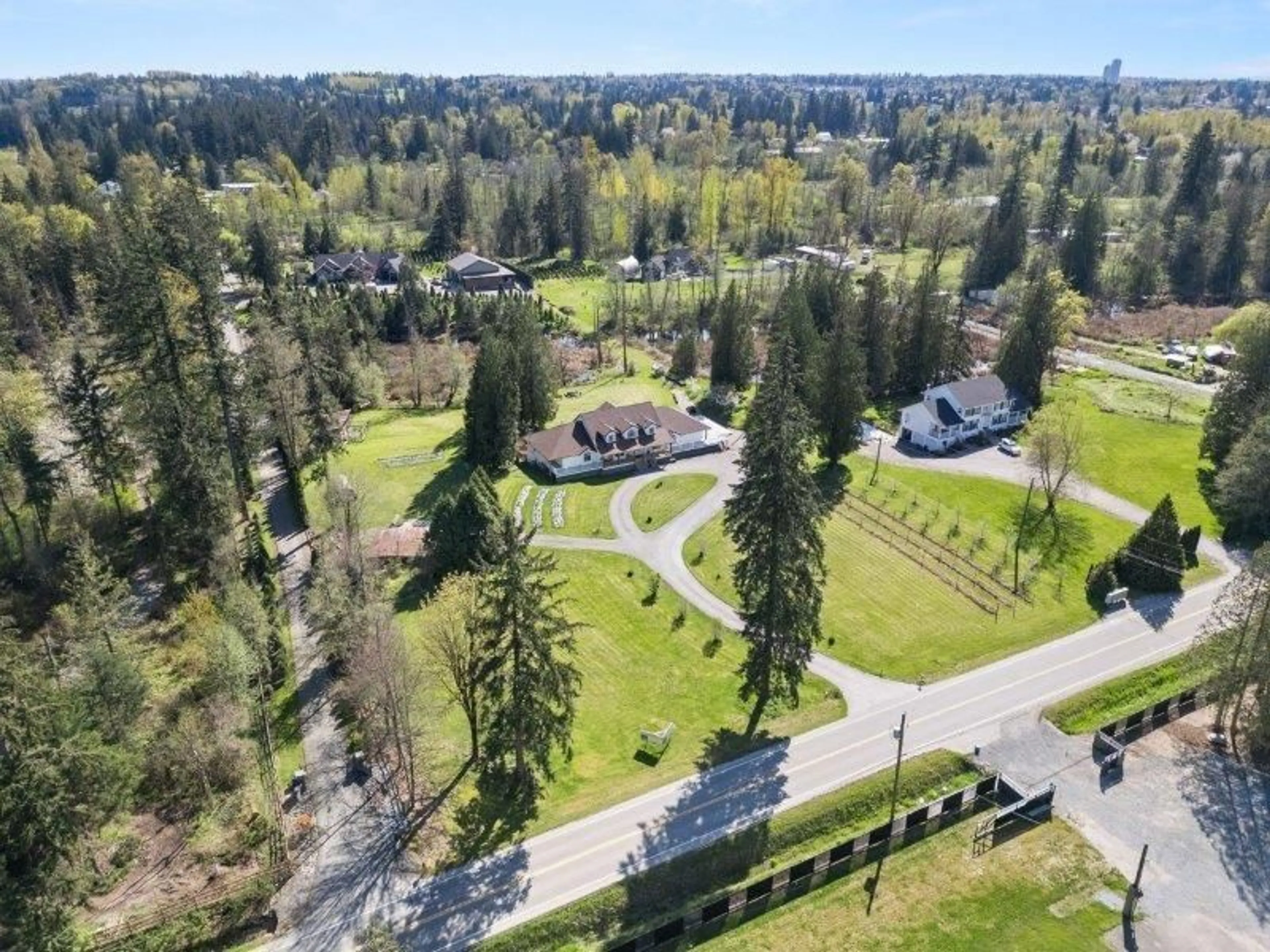 A pic from outside/outdoor area/front of a property/back of a property/a pic from drone, forest/trees view for 21980 100, Langley British Columbia V1M3V1