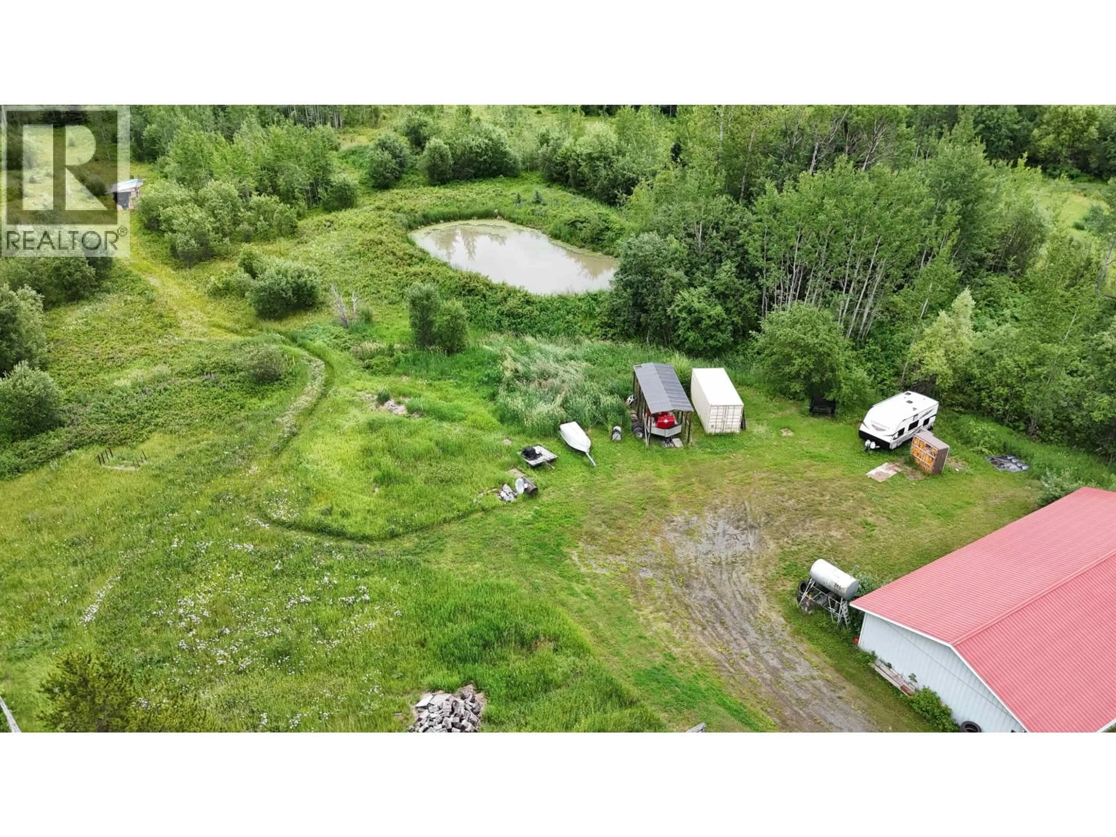 A pic from outside/outdoor area/front of a property/back of a property/a pic from drone, water/lake/river/ocean view for 7550 POOLEY ROAD, Prince George British Columbia V2N5W4