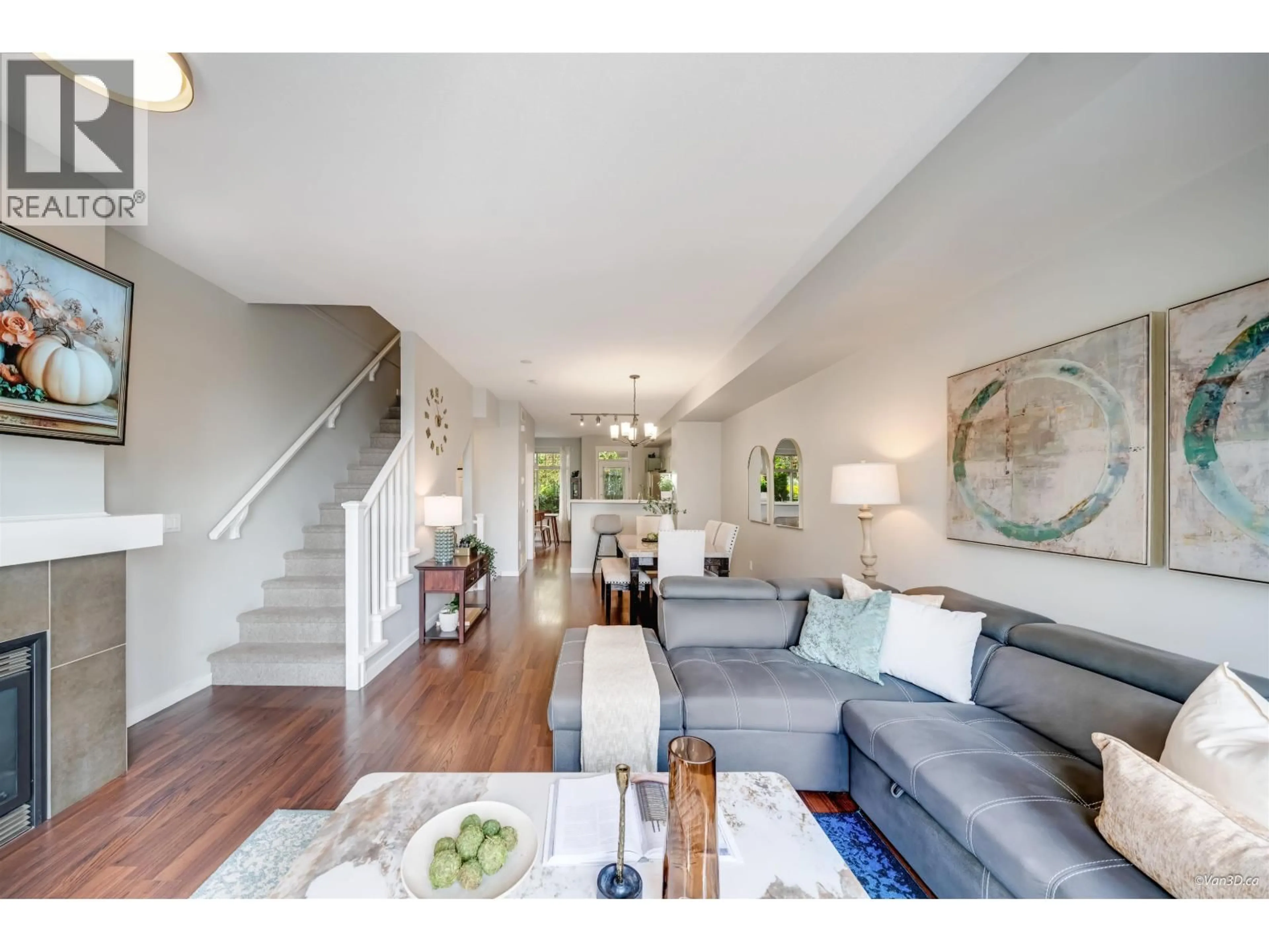 Living room with furniture, wood/laminate floor for 92 - 55 HAWTHORN DRIVE, Port Moody British Columbia V3H0B3
