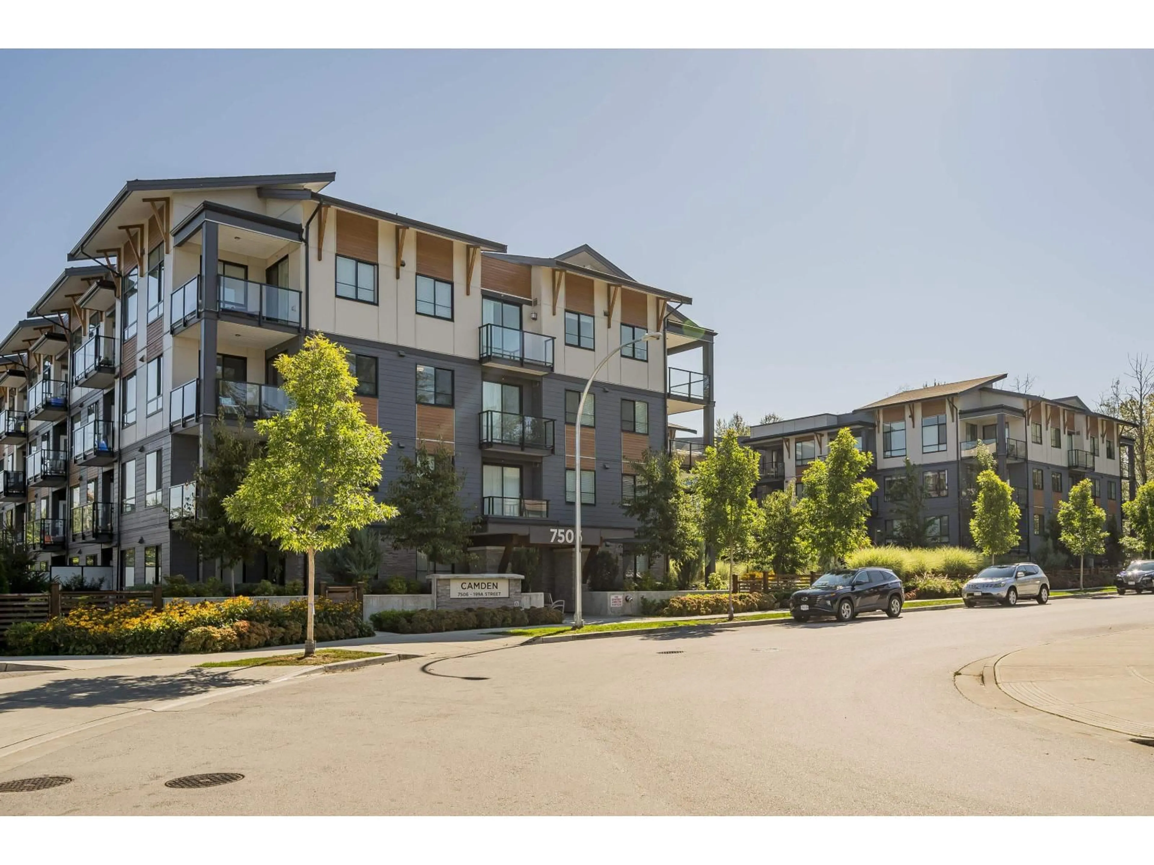 A pic from outside/outdoor area/front of a property/back of a property/a pic from drone, unknown for 122 - 7506 199A, Langley British Columbia V2Y3K9