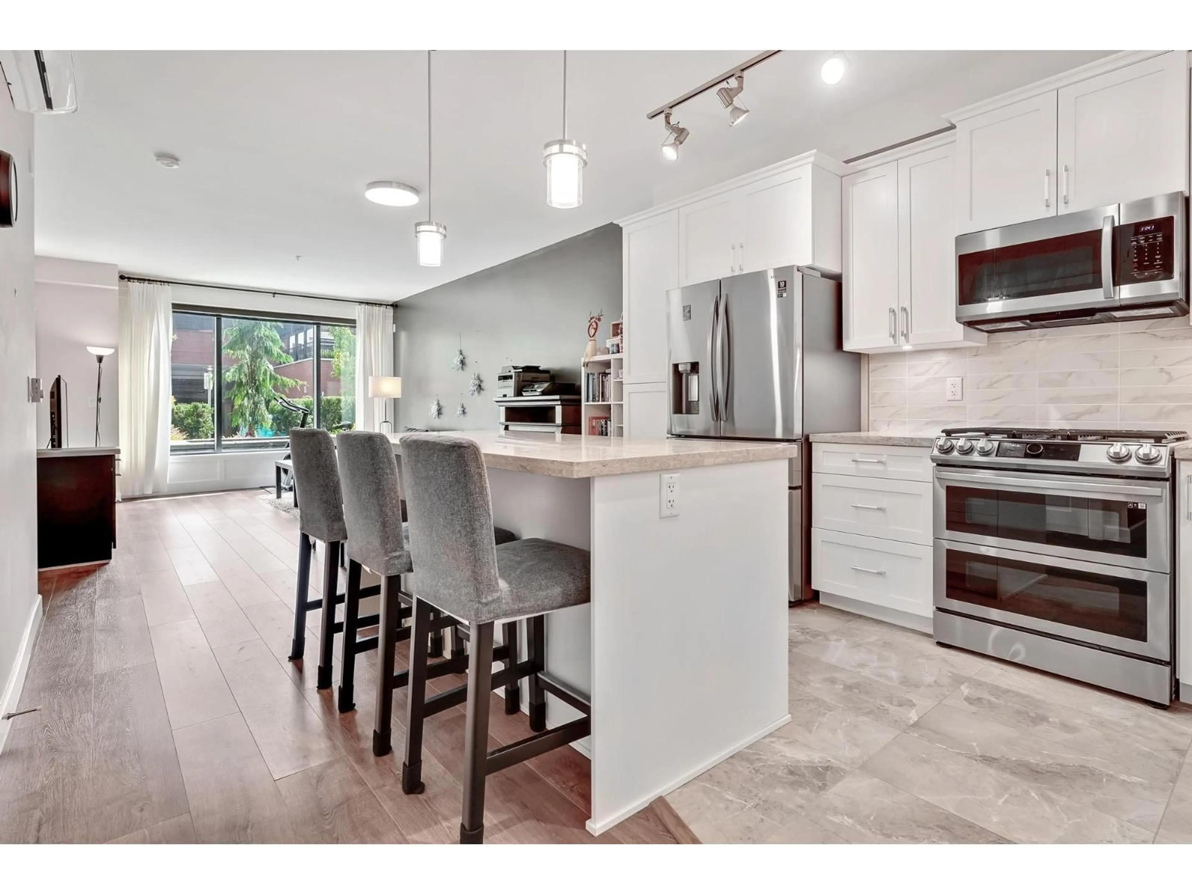 Open concept kitchen, ceramic/tile floor for 110 - 8561 203A, Langley British Columbia V2Y3L7