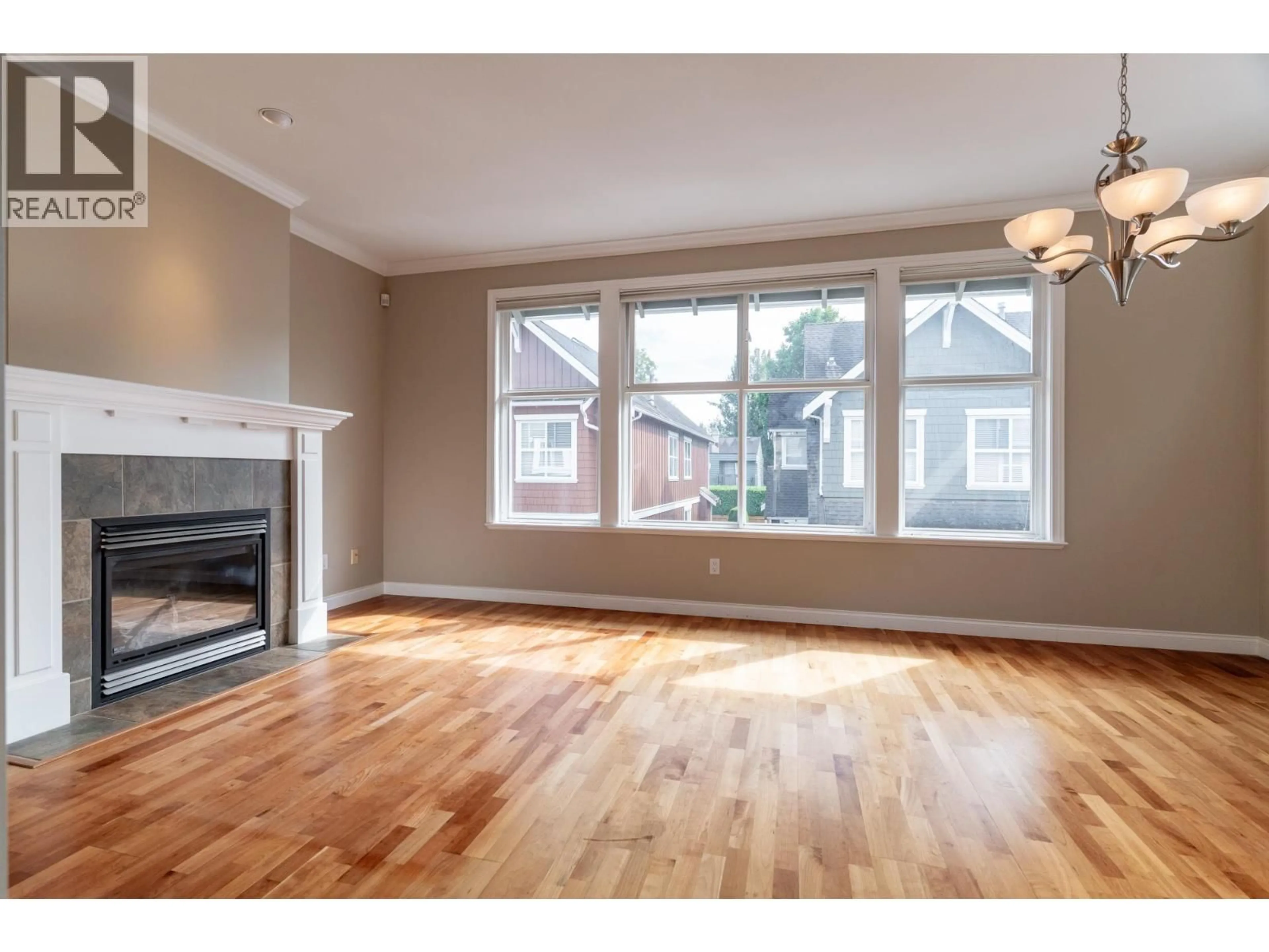 Living room with furniture, wood/laminate floor for 40 - 3088 FRANCIS ROAD, Richmond British Columbia V7C5V9