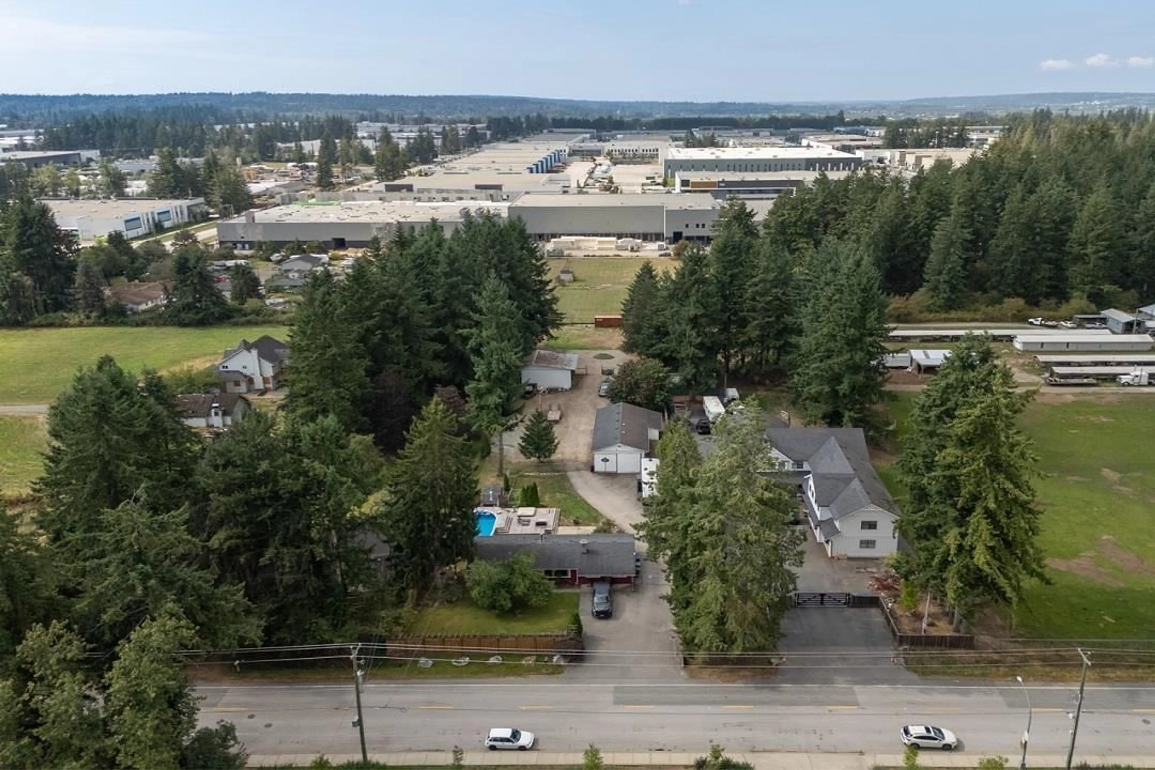 A pic from outside/outdoor area/front of a property/back of a property/a pic from drone, mountain view for 3283 196, Surrey British Columbia V3Z1A9