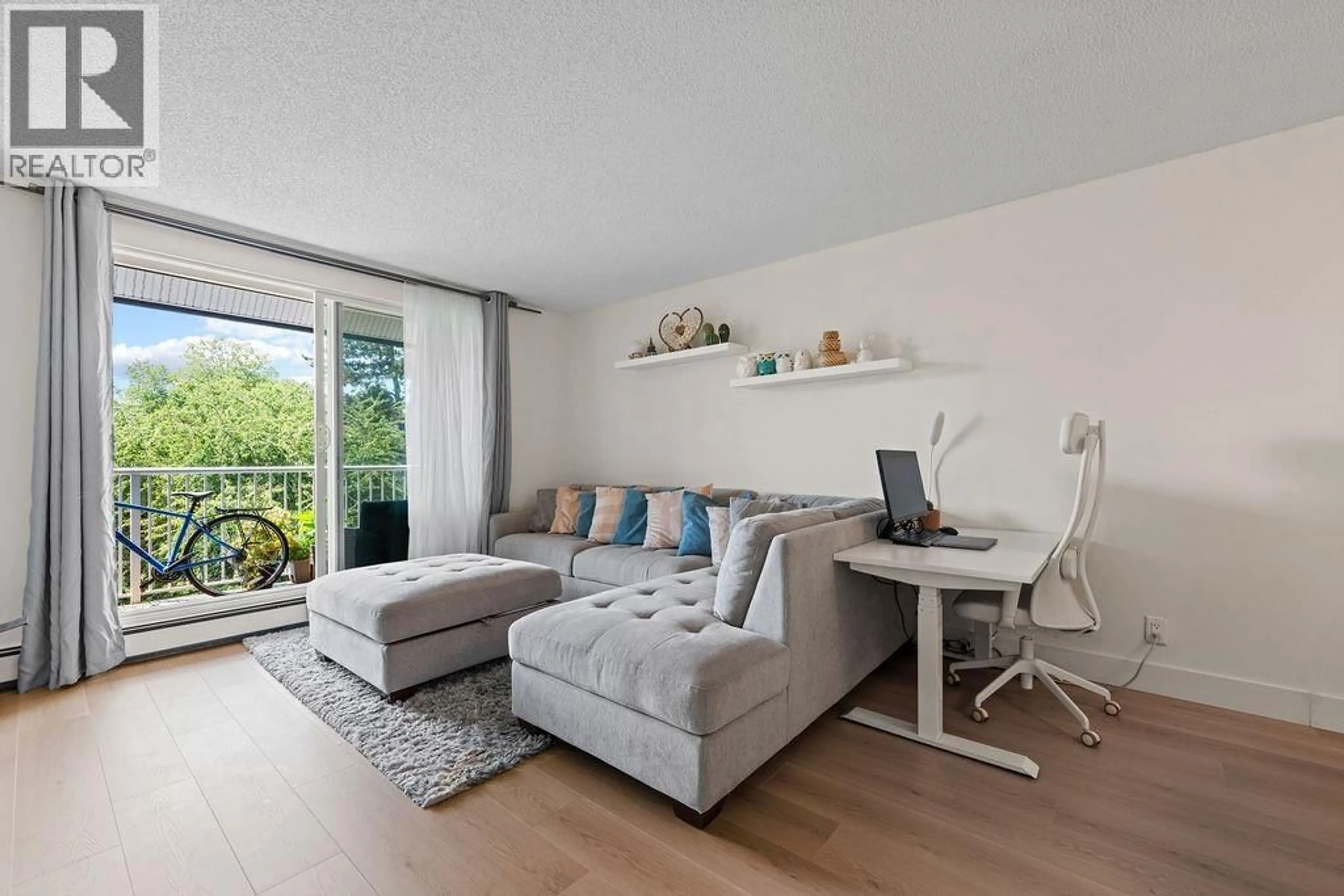 Living room with furniture, wood/laminate floor for 303 - 8870 CITATION DRIVE, Richmond British Columbia V6Y3A3