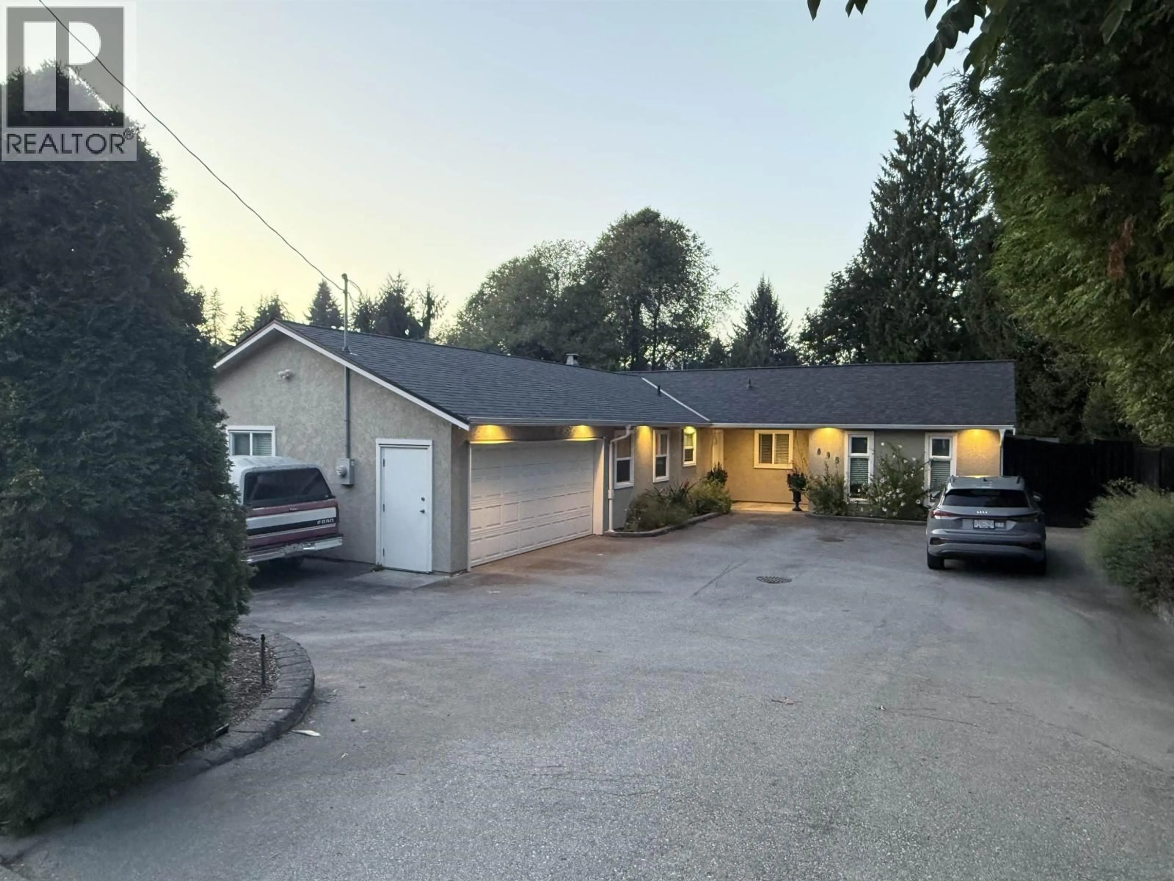 A pic from outside/outdoor area/front of a property/back of a property/a pic from drone, street for 895 COMO LAKE AVENUE, Coquitlam British Columbia V3J3M7