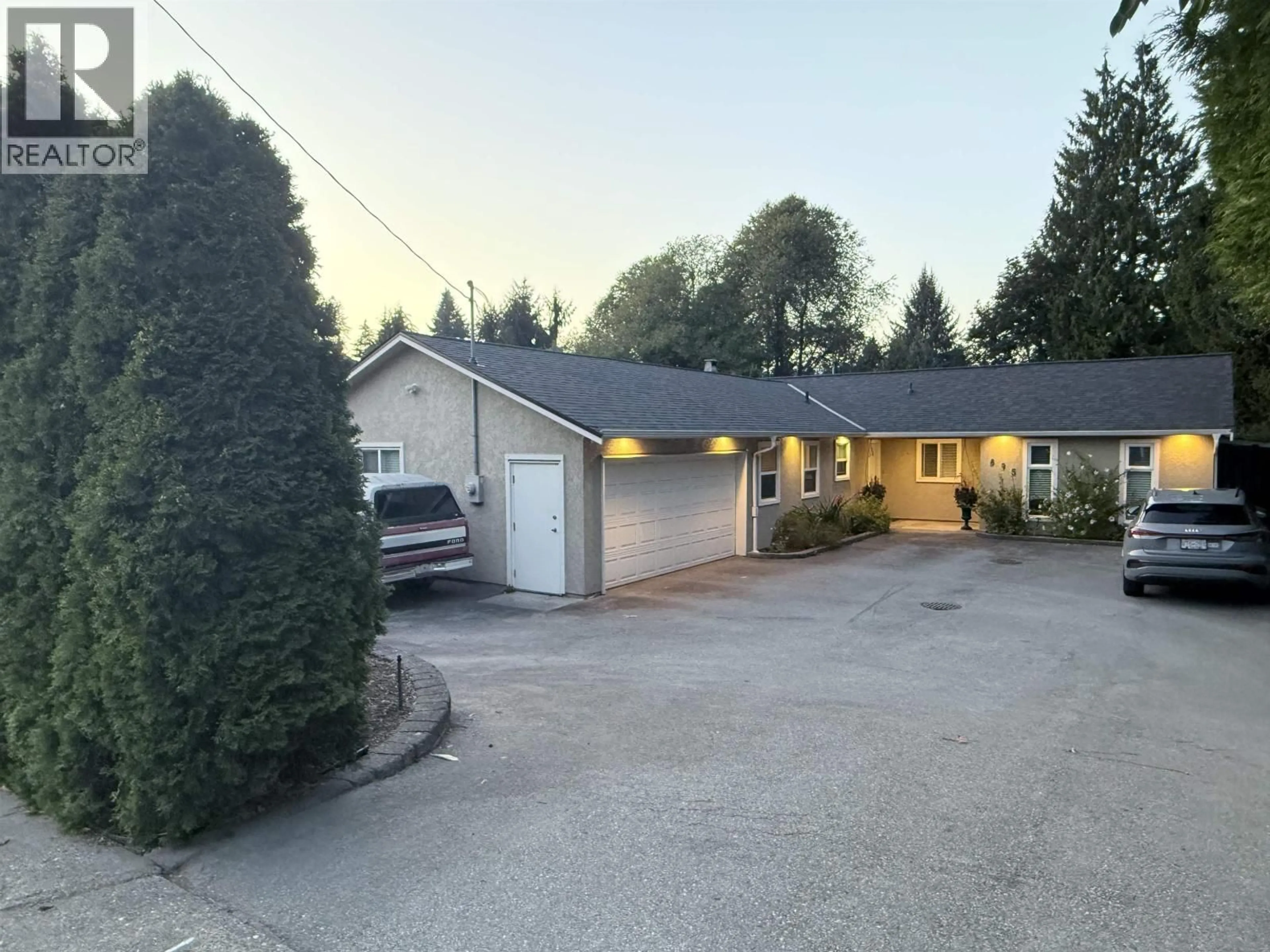 A pic from outside/outdoor area/front of a property/back of a property/a pic from drone, street for 895 COMO LAKE AVENUE, Coquitlam British Columbia V3J3M7